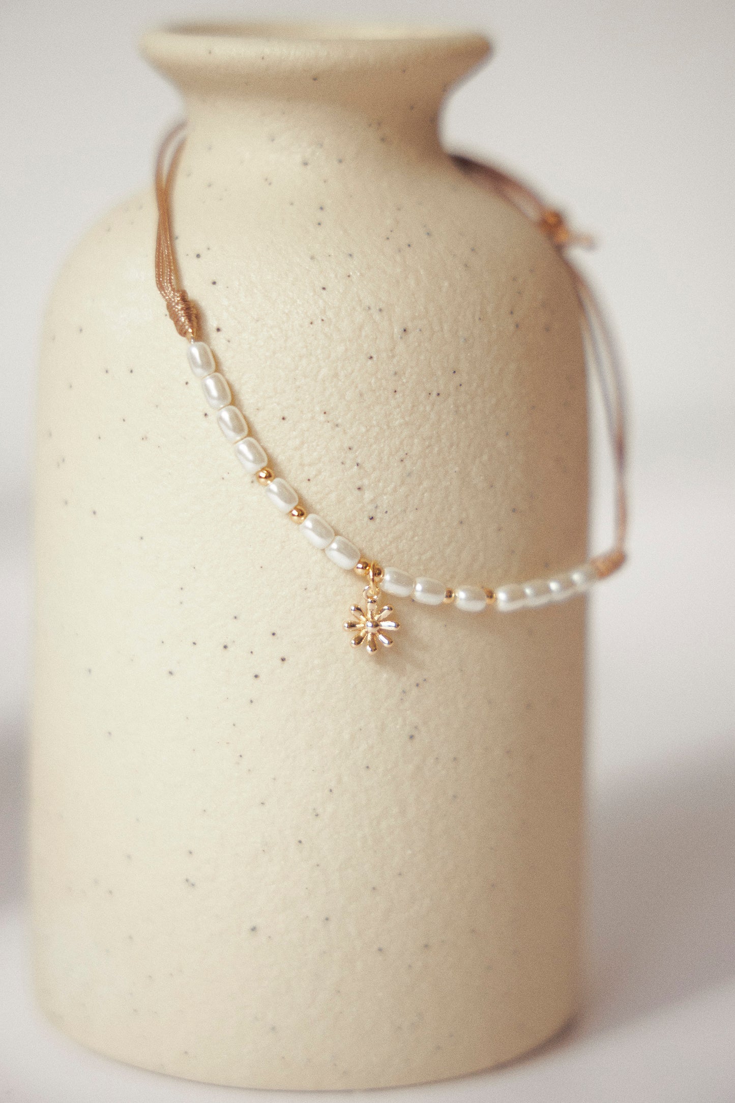 Flower and pearl bracelet