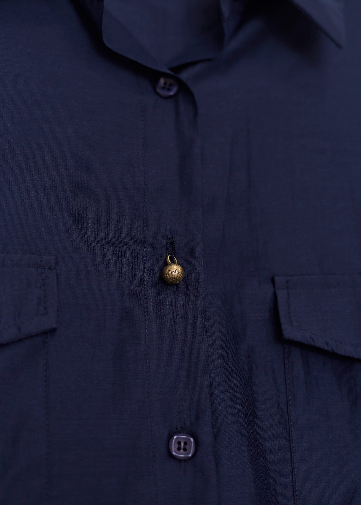 Camisa organza bolsillos