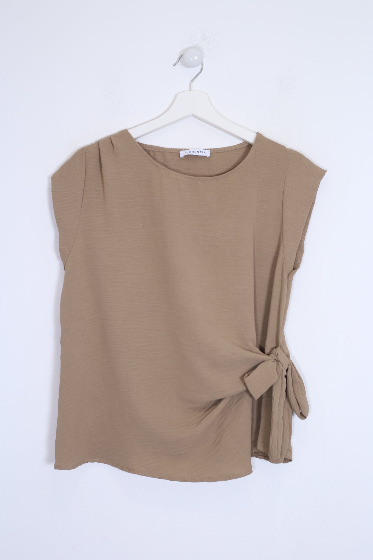 Top nudo fluido