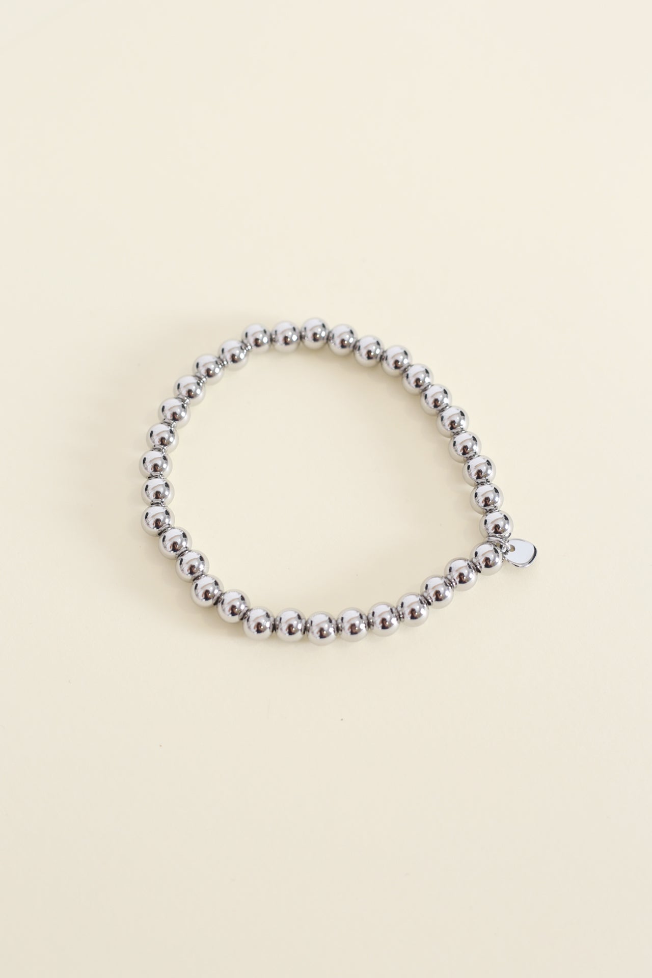 Pulsera bolitas medalla