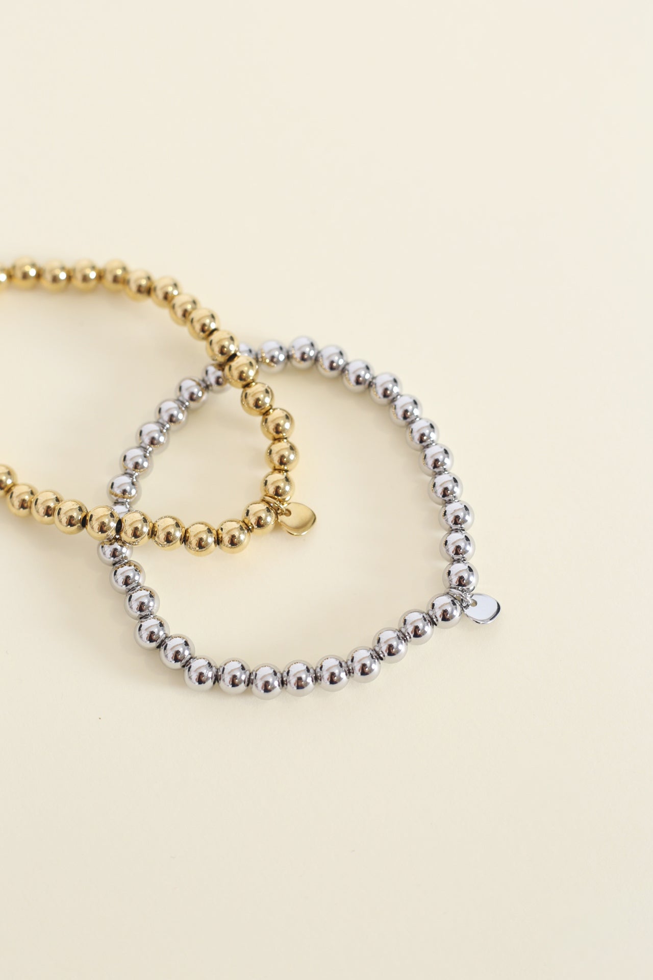 Pulsera bolitas medalla