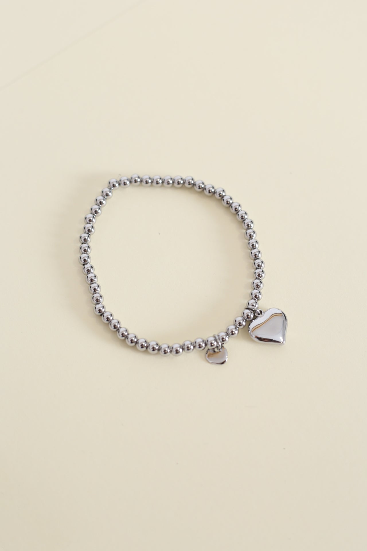 Pulsera bolitas corazón