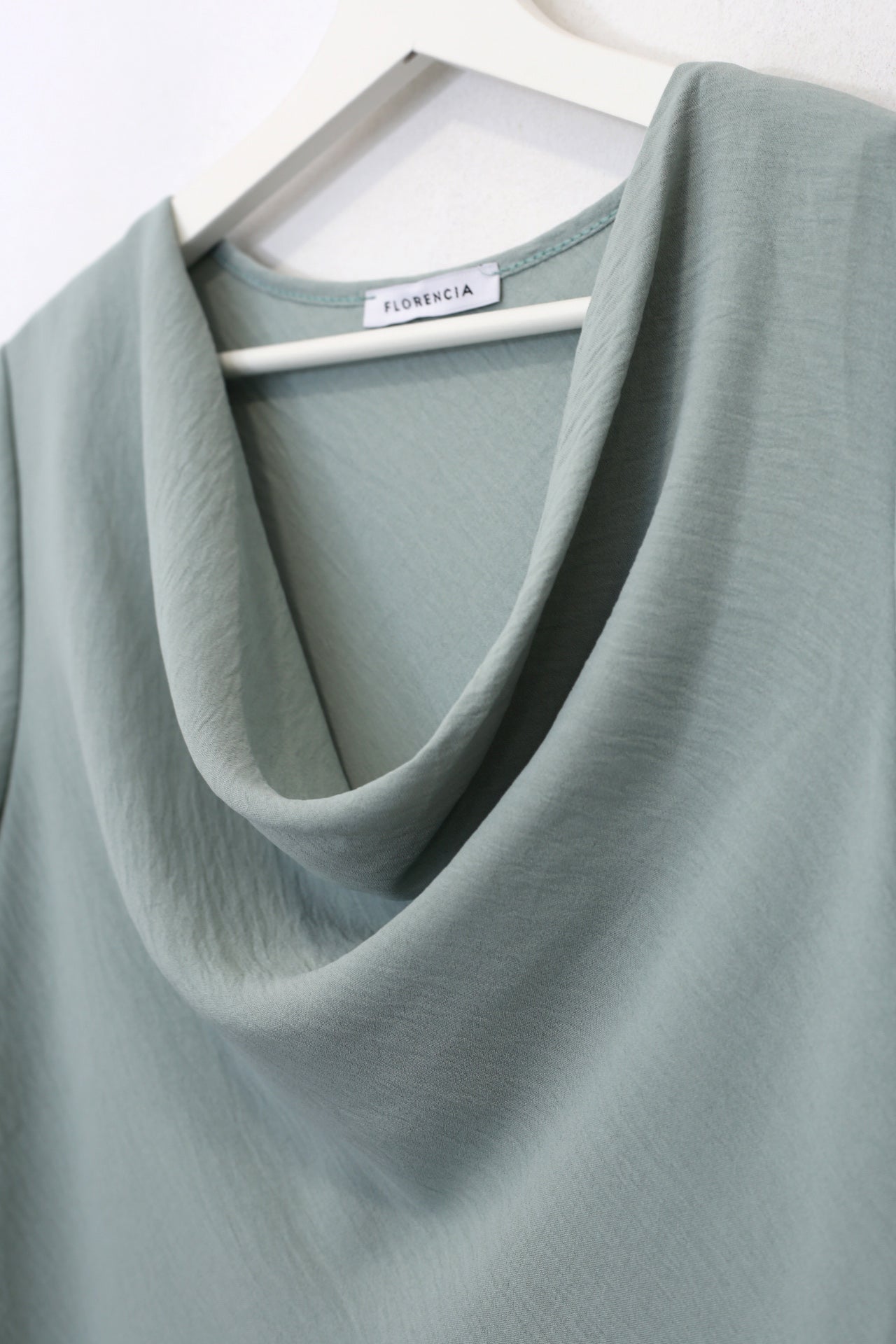 Blusa desbocada fluida