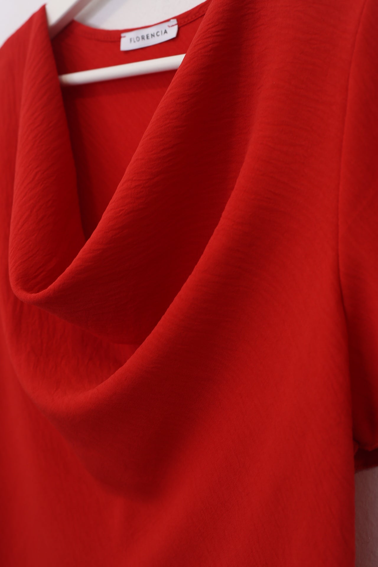 Blusa desbocada fluida