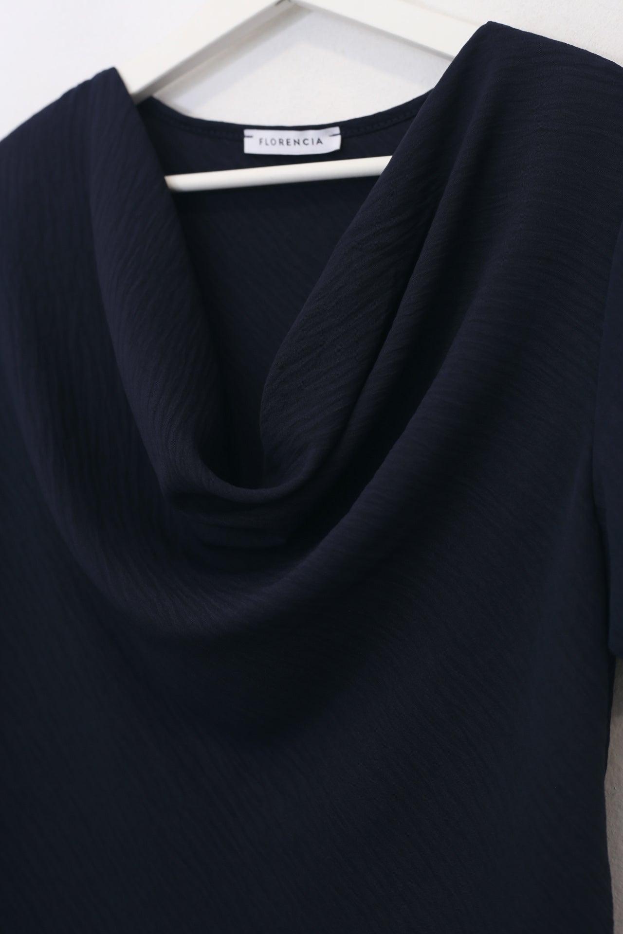 Blusa desbocada fluida