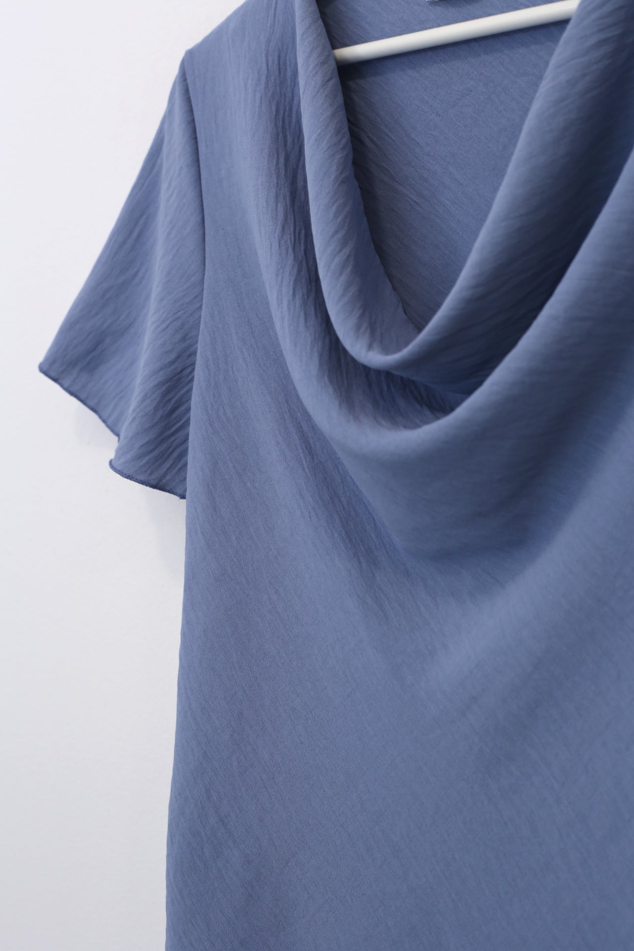 Blusa desbocada fluida