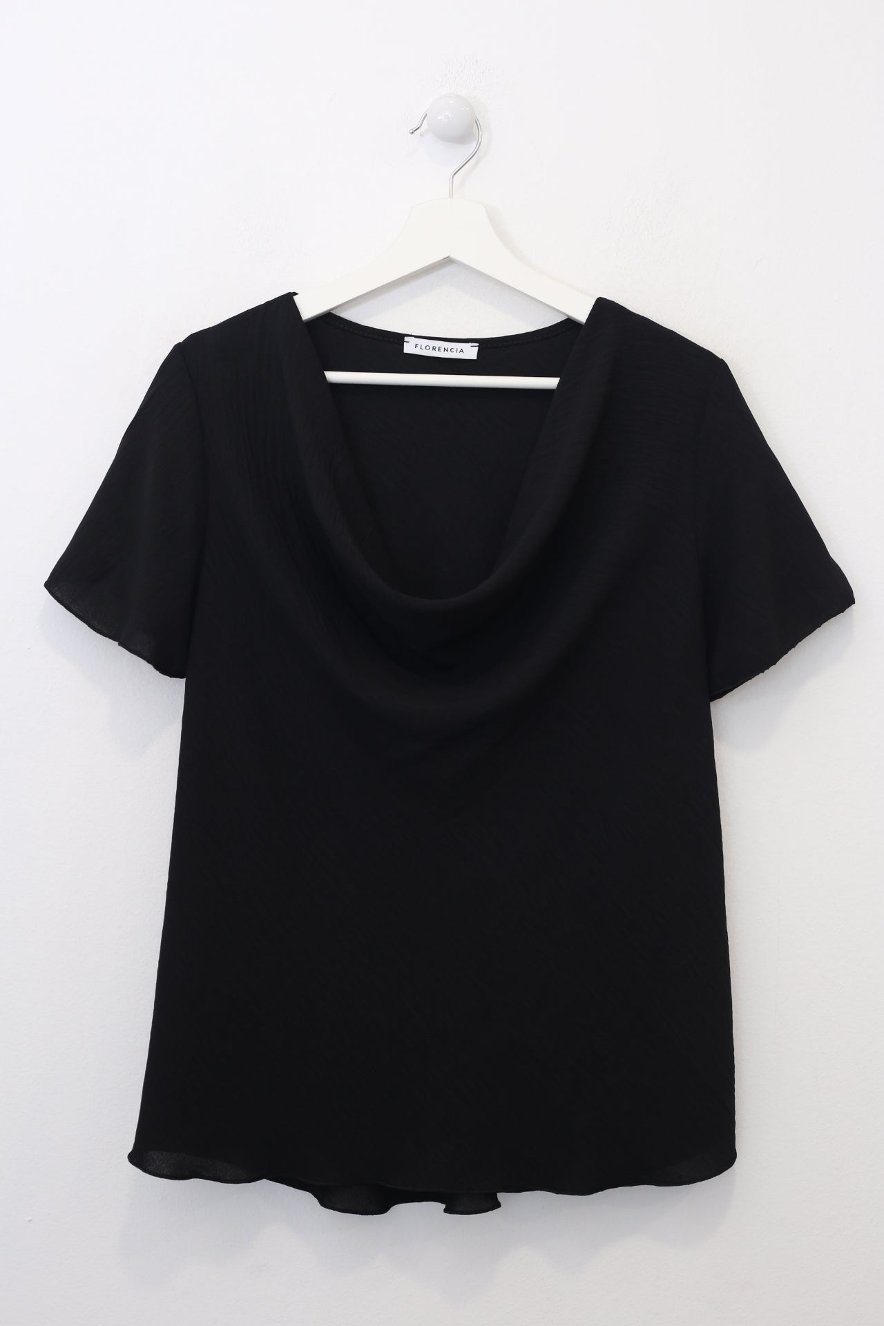 Blusa desbocada fluida