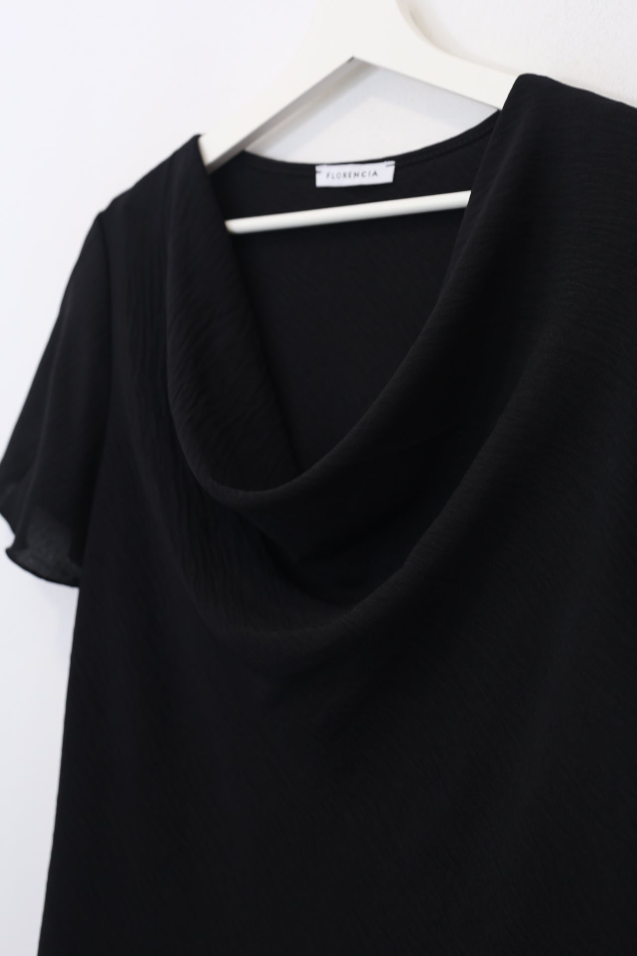 Blusa desbocada fluida