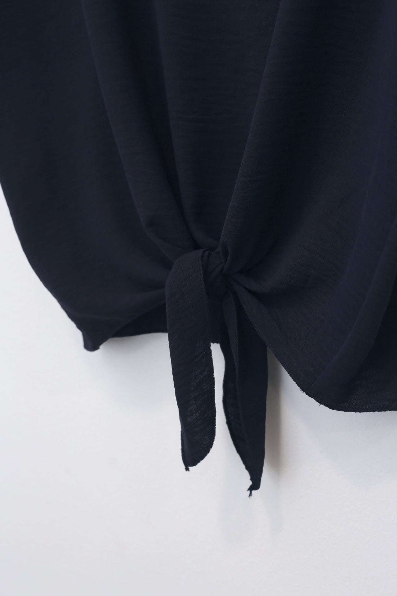 Blusa fluida nudo
