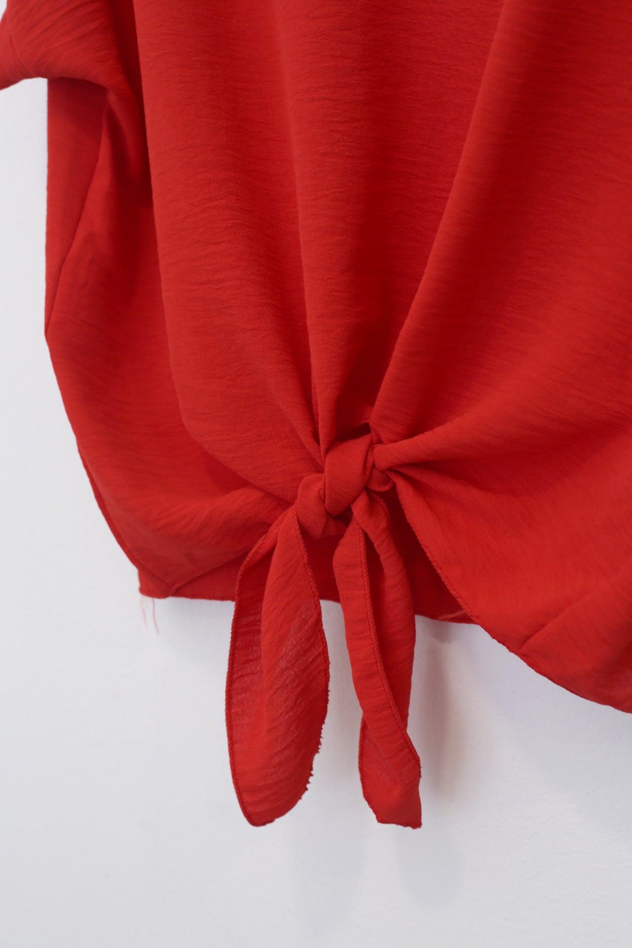 Blusa fluida nudo