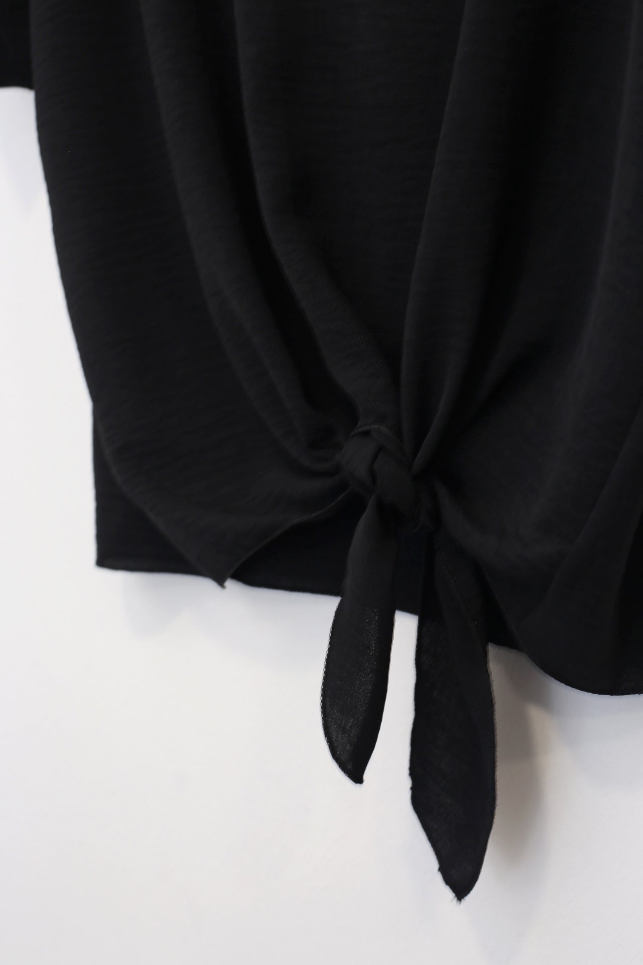 Blusa fluida nudo