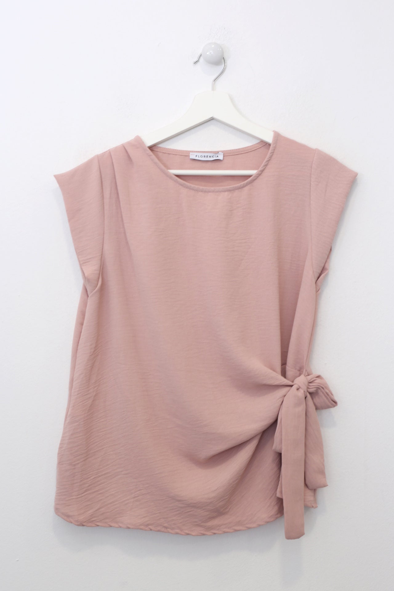 Top nudo fluido
