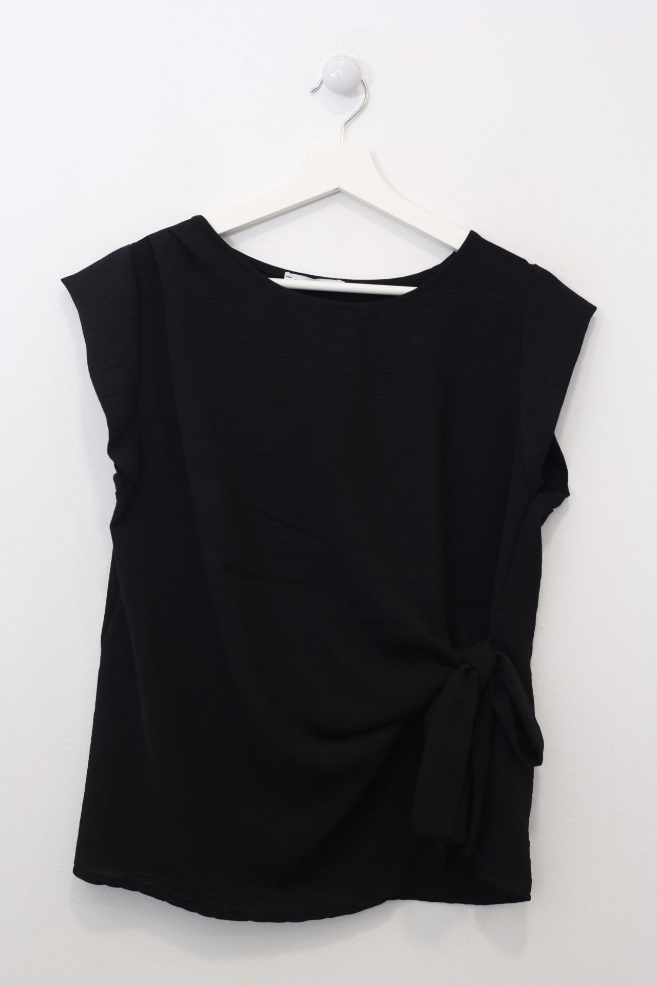 Top nudo fluido