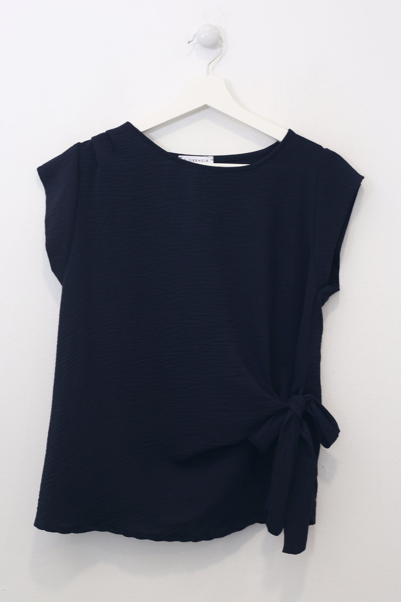 Top nudo fluido