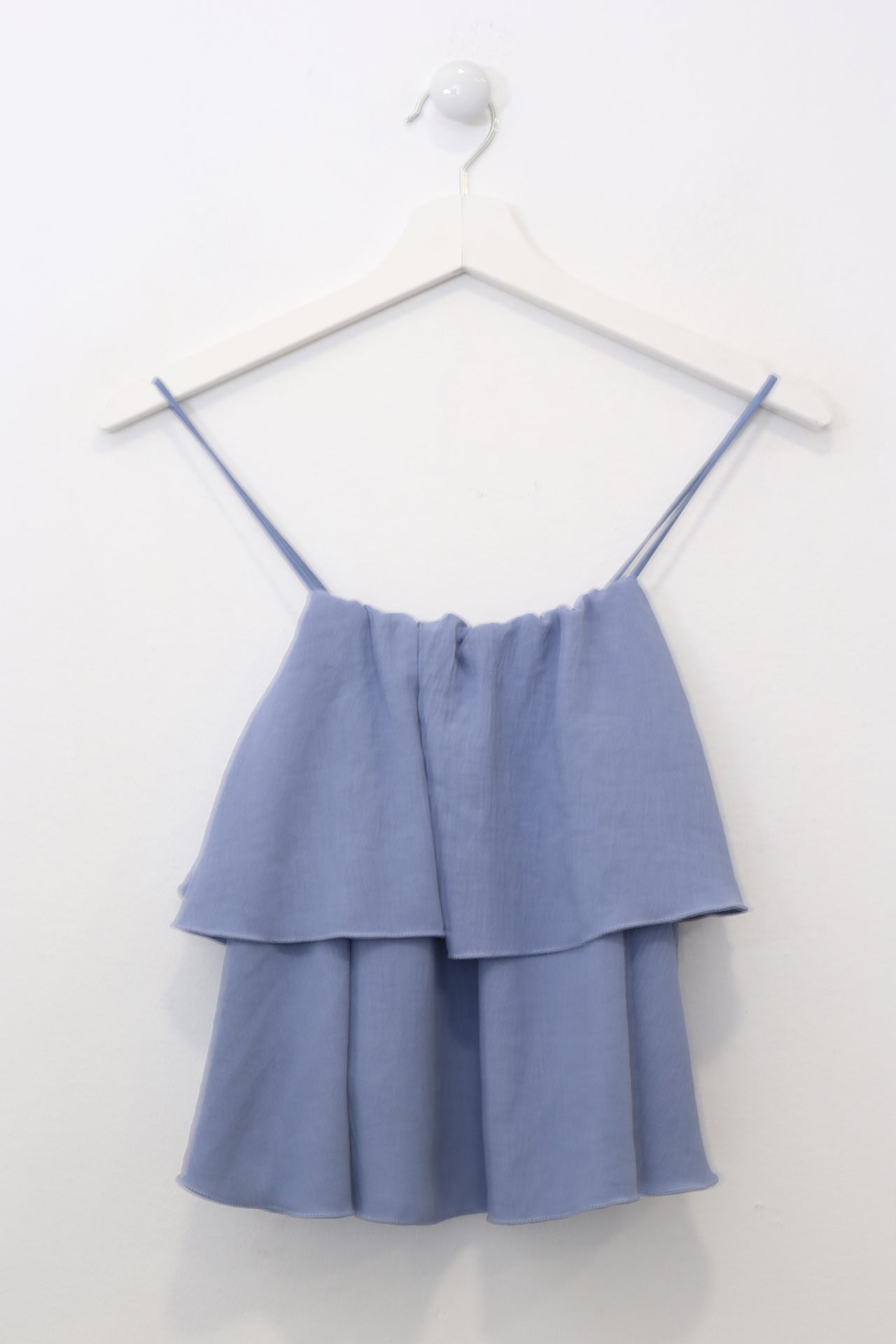 Top volante fluido