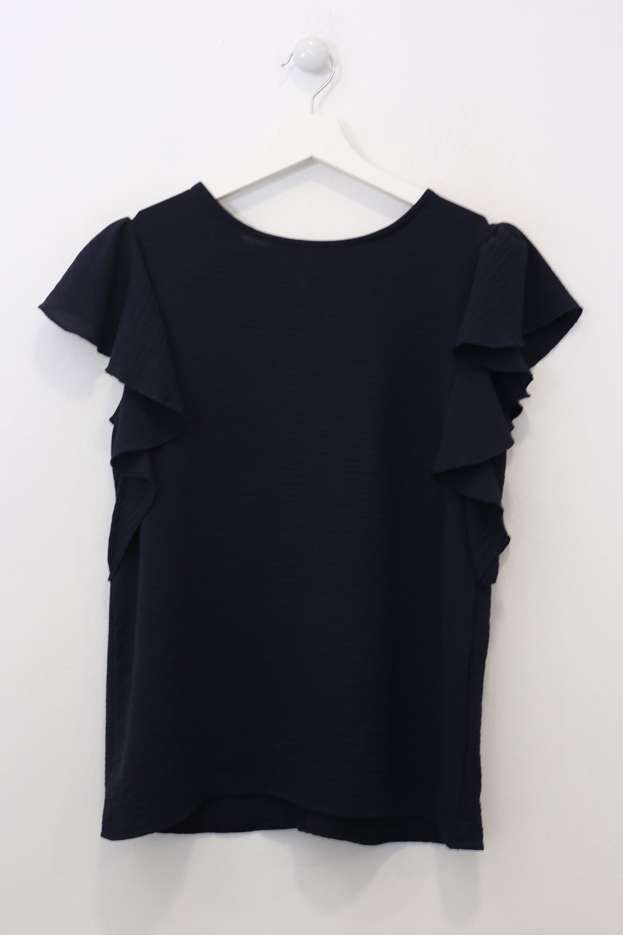 Top volante fluido