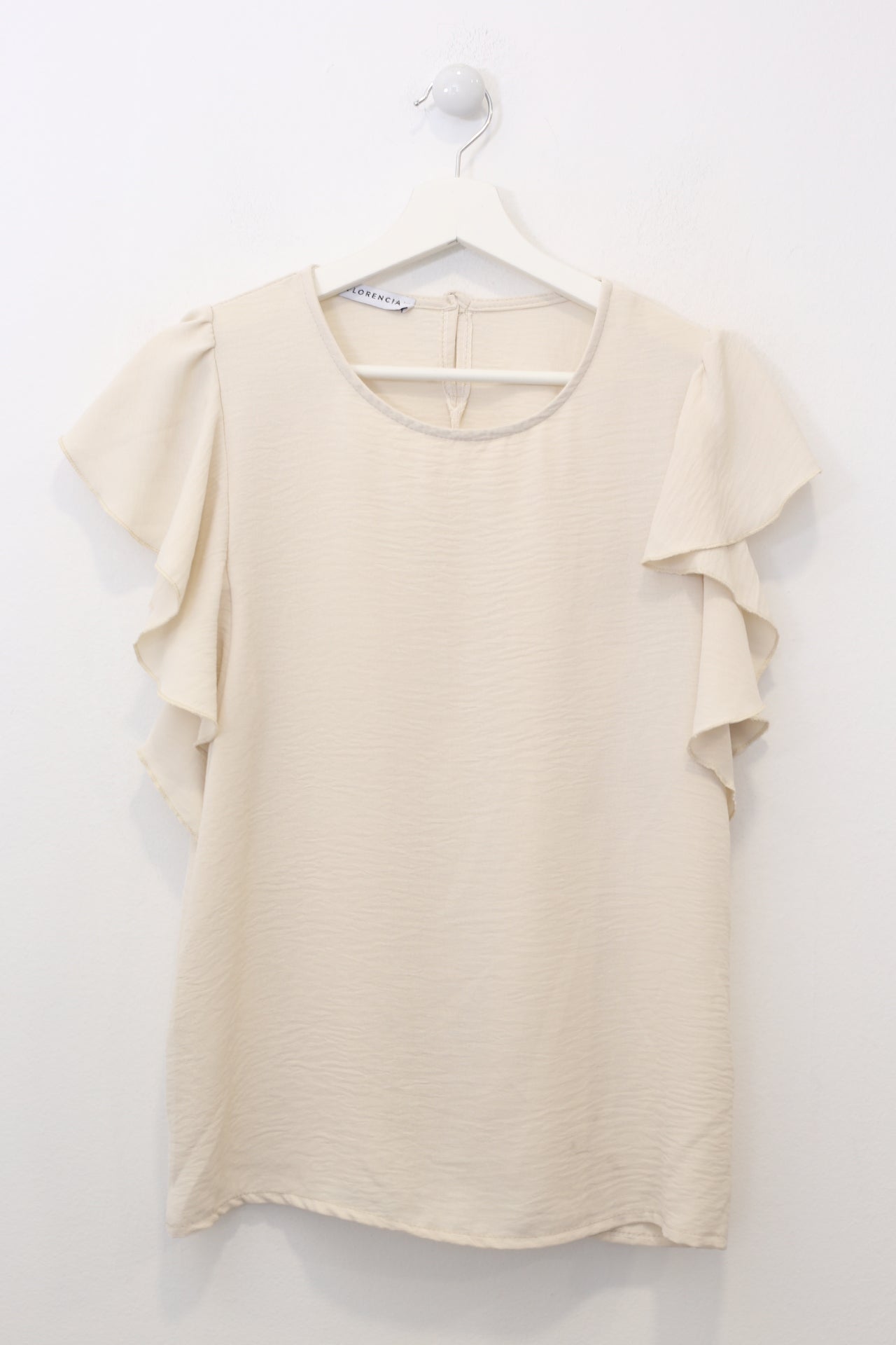 Top volante fluido