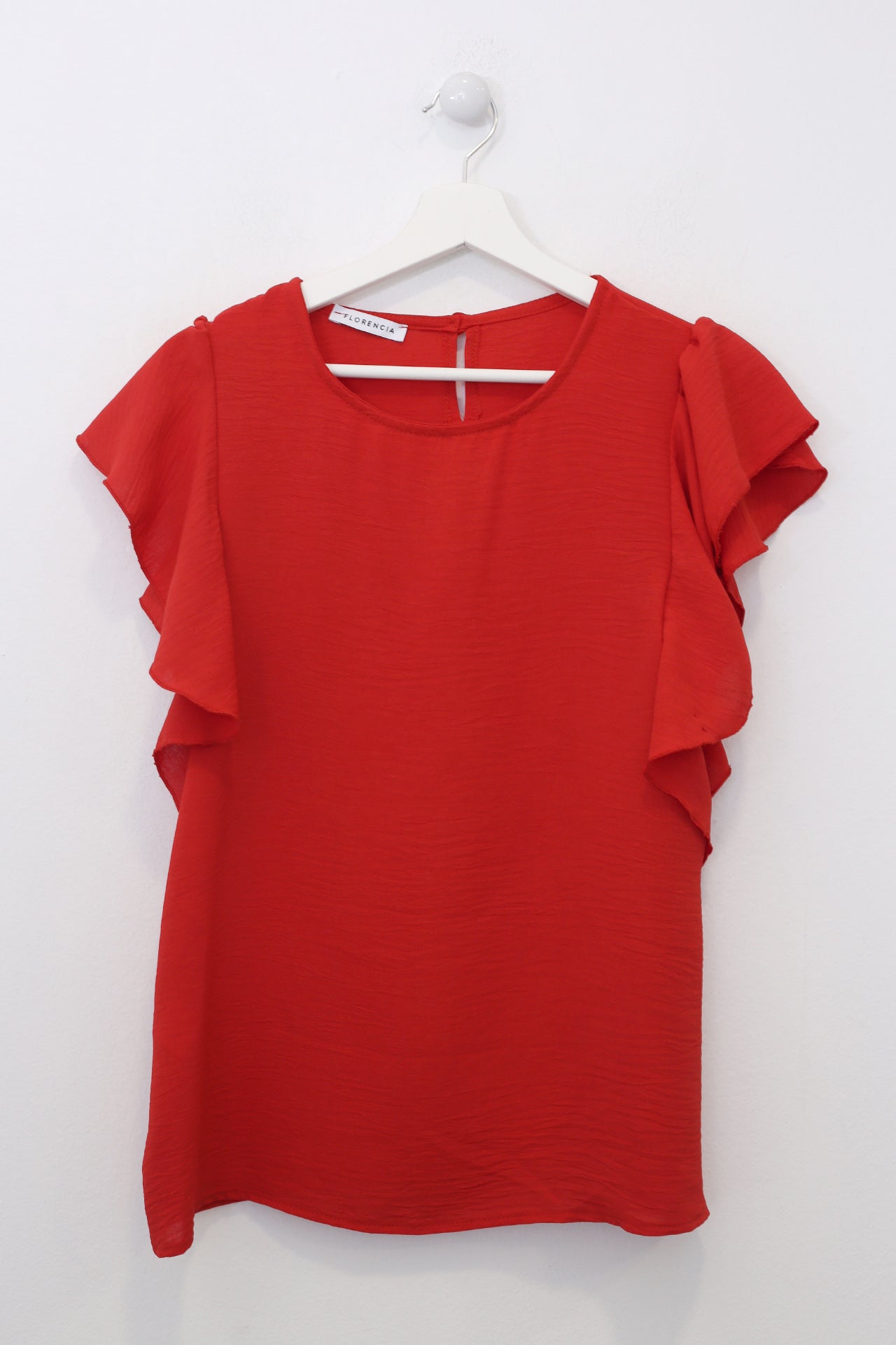 Top volante fluido