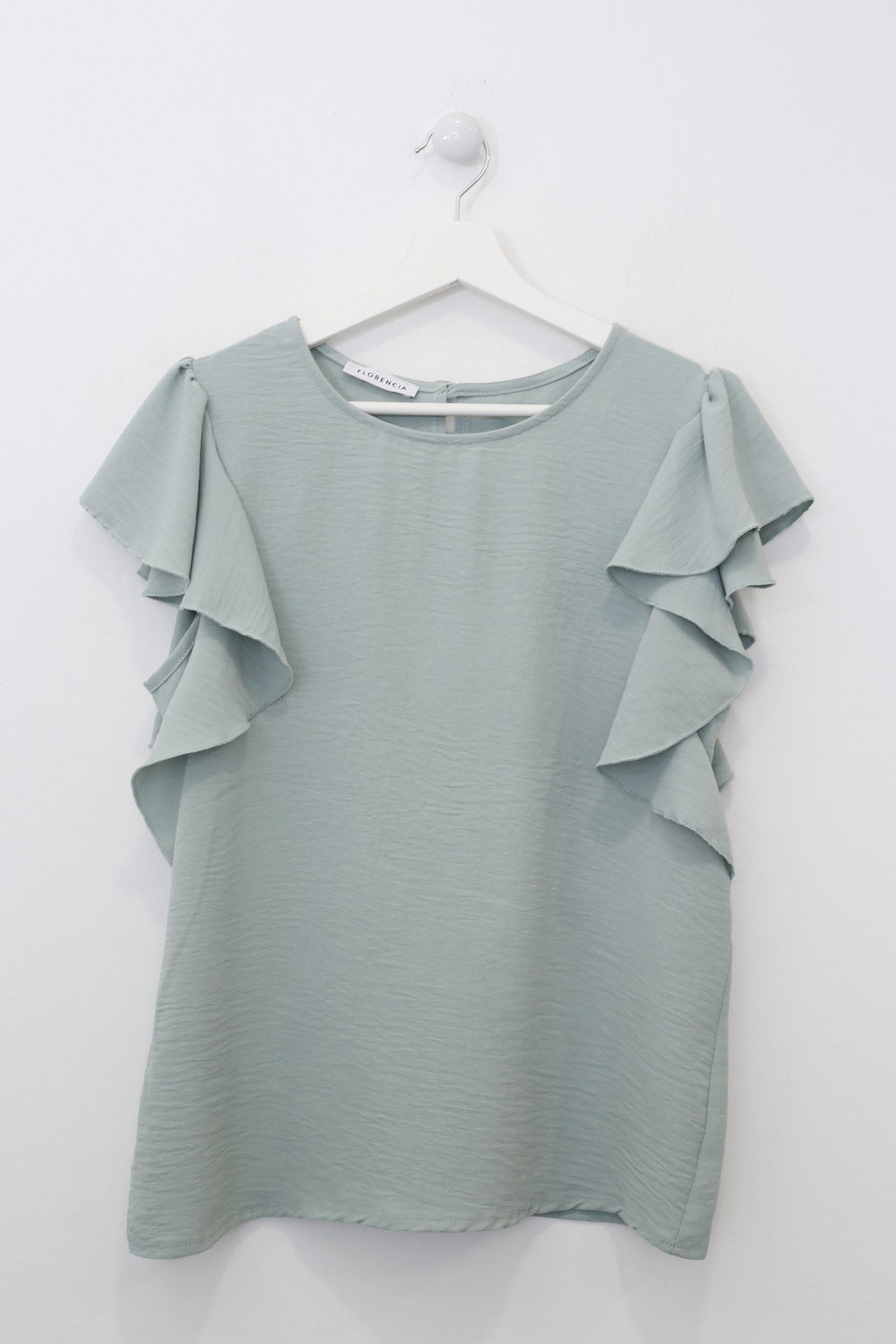 Top volante fluido