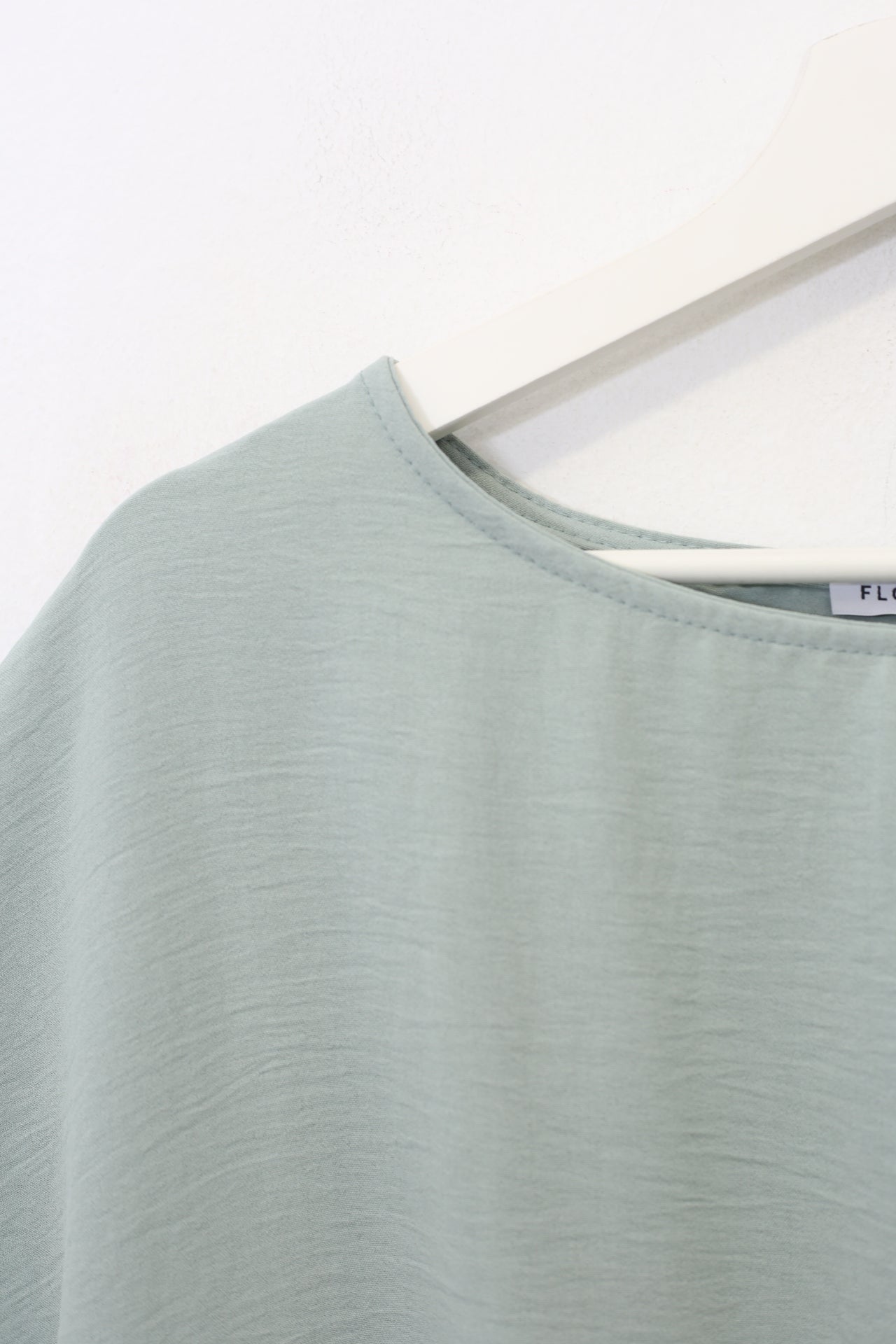 Blusa fluida nudo