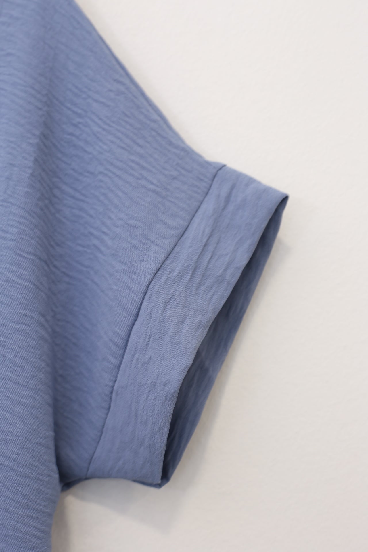 Blusa fluida nudo