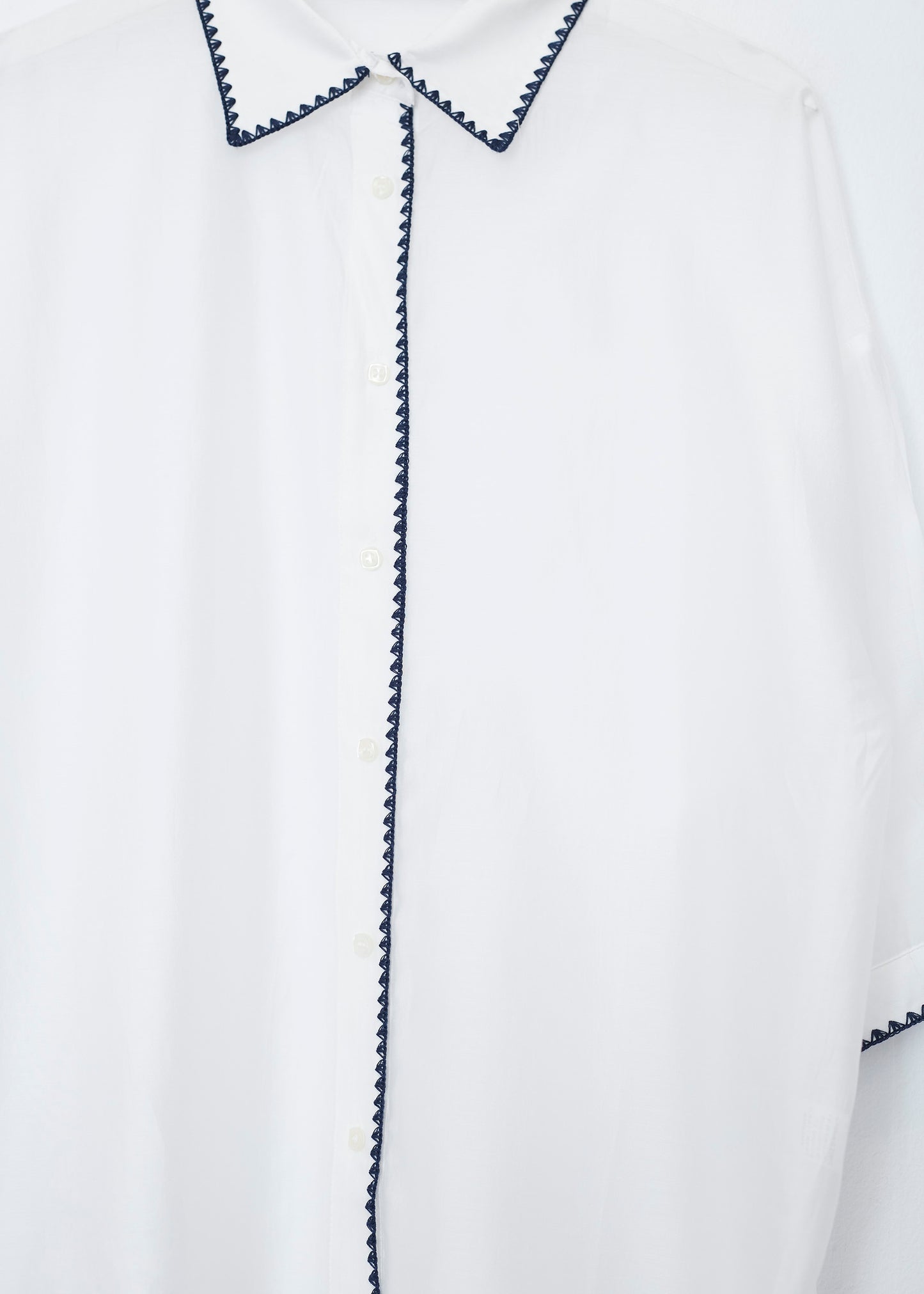 Organza shirt with crochet detail