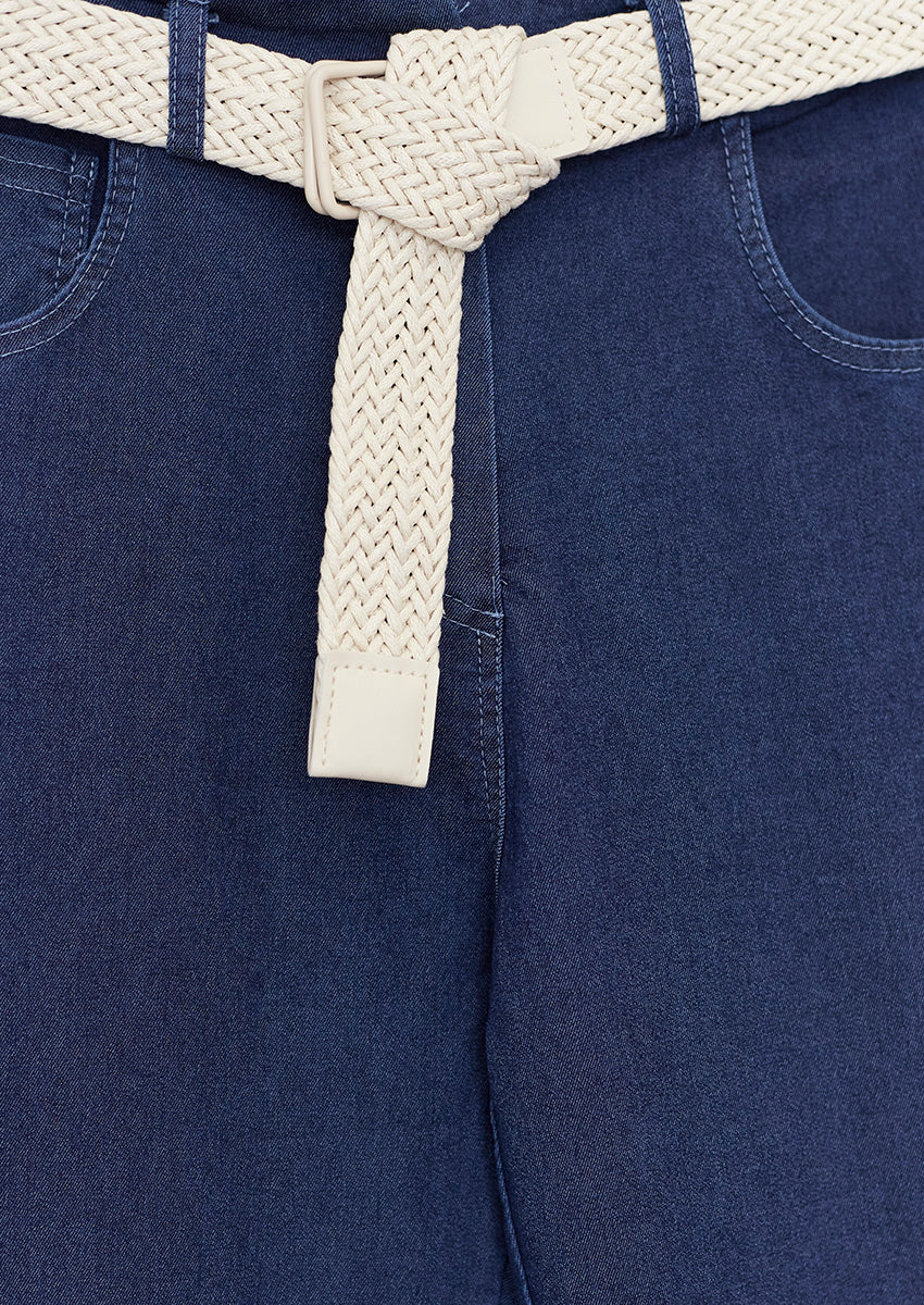 Belted skinny jeans