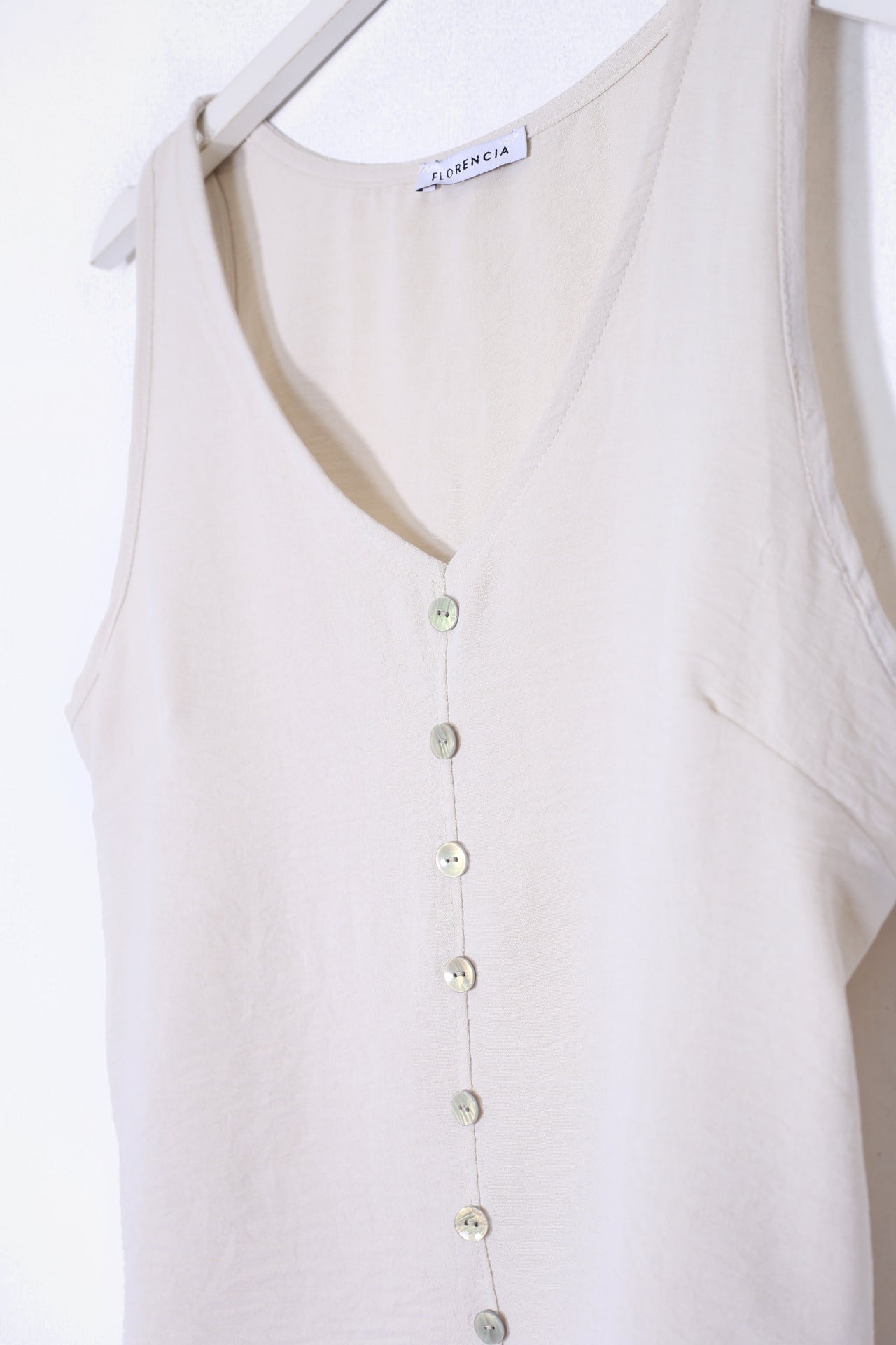 Top fluido botones