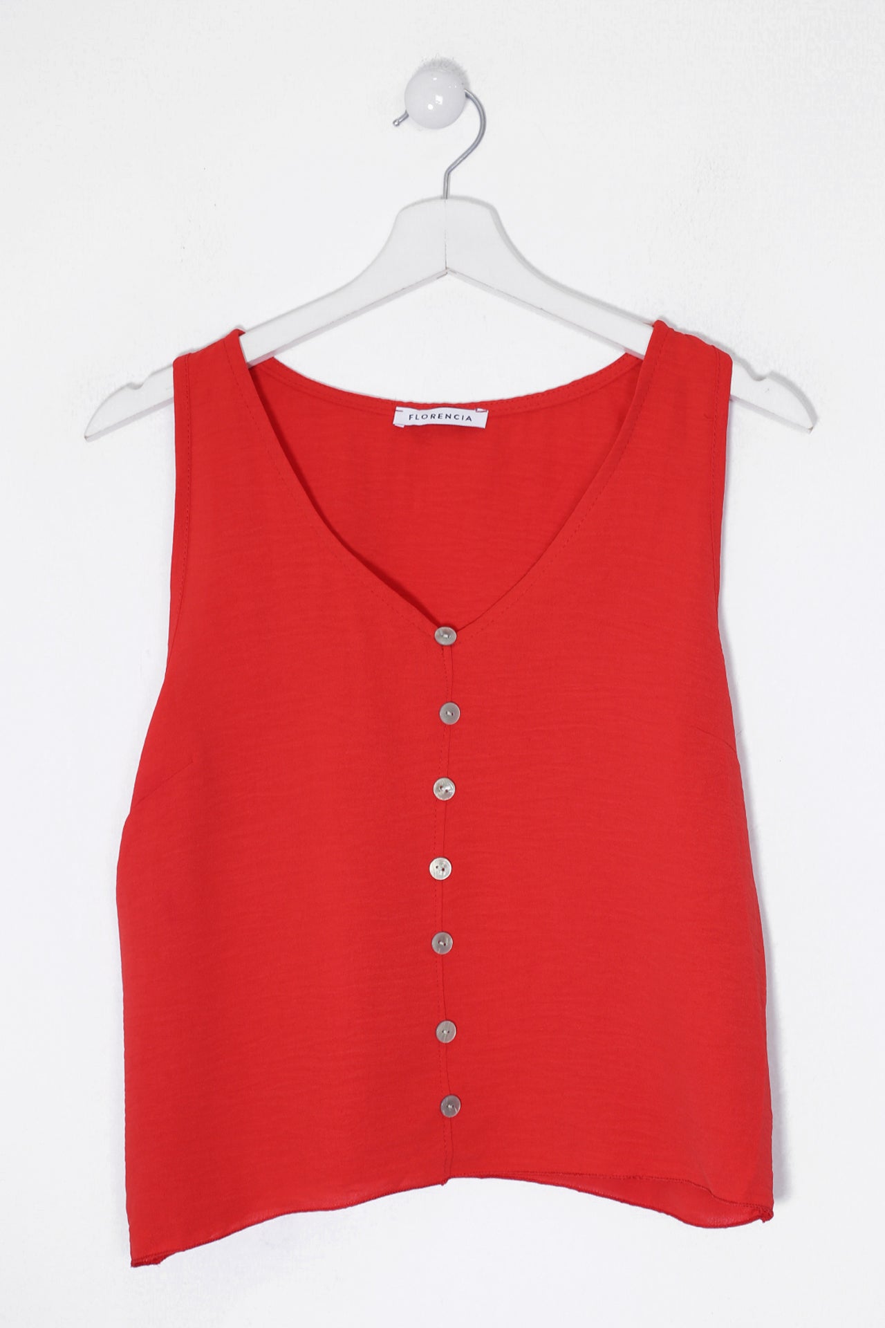 Top fluido botones
