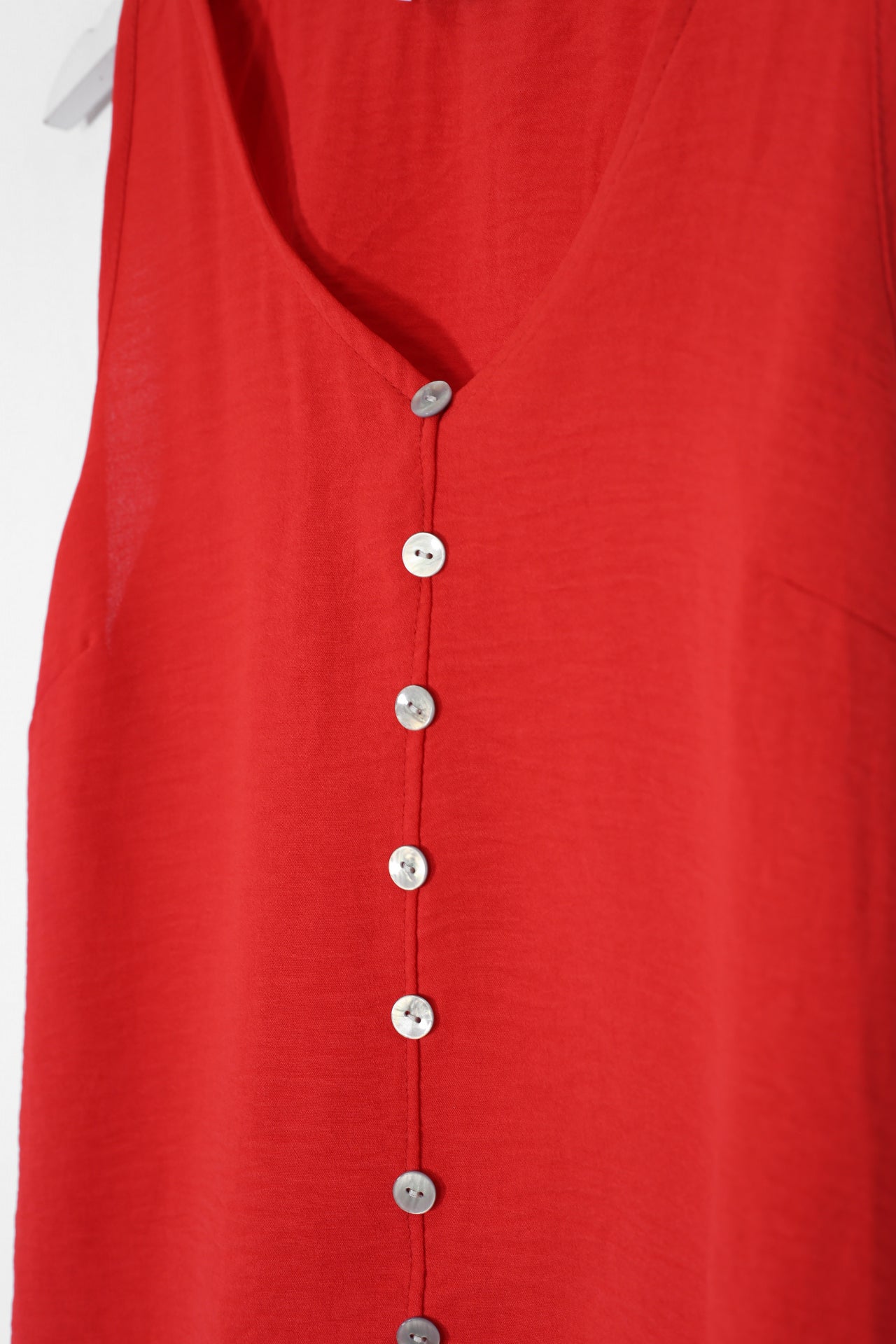 Top fluido botones