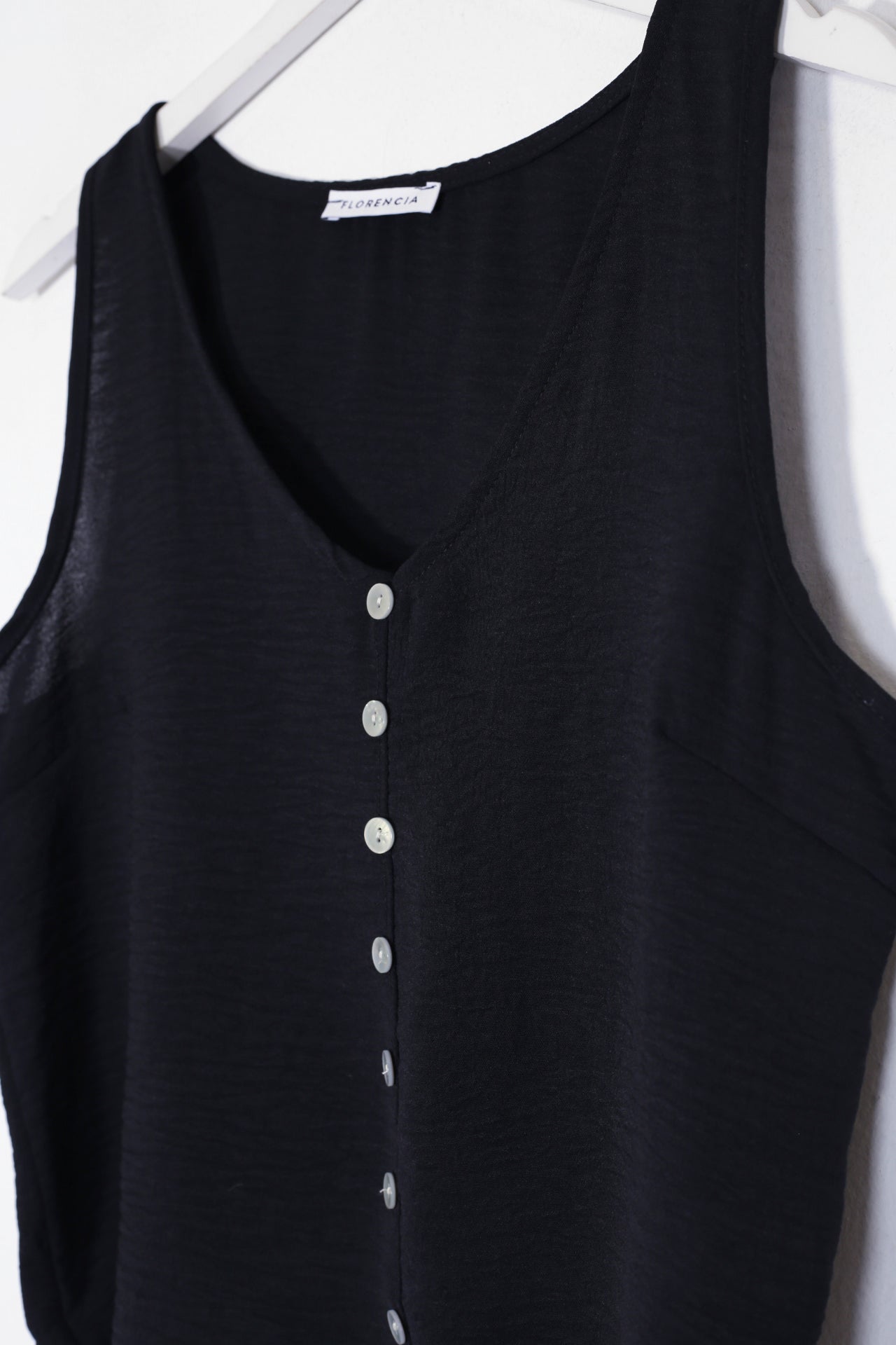 Top fluido botones