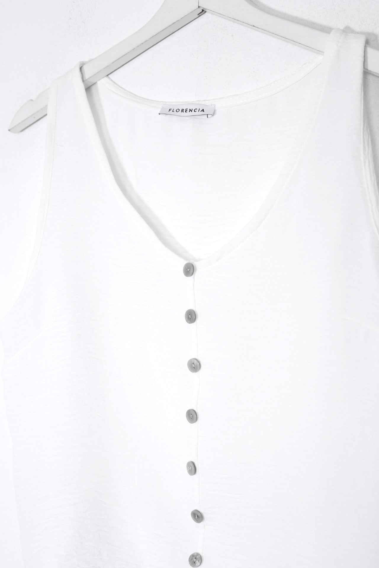 Top fluido botones