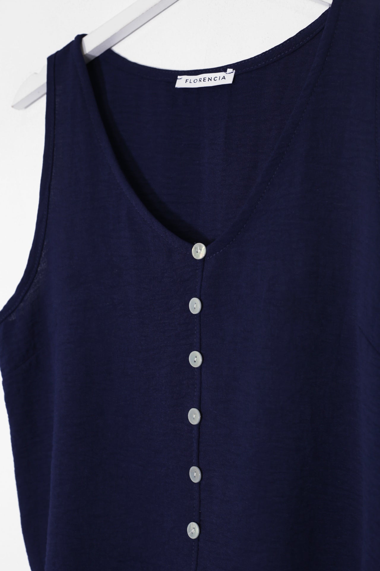Top fluido botones