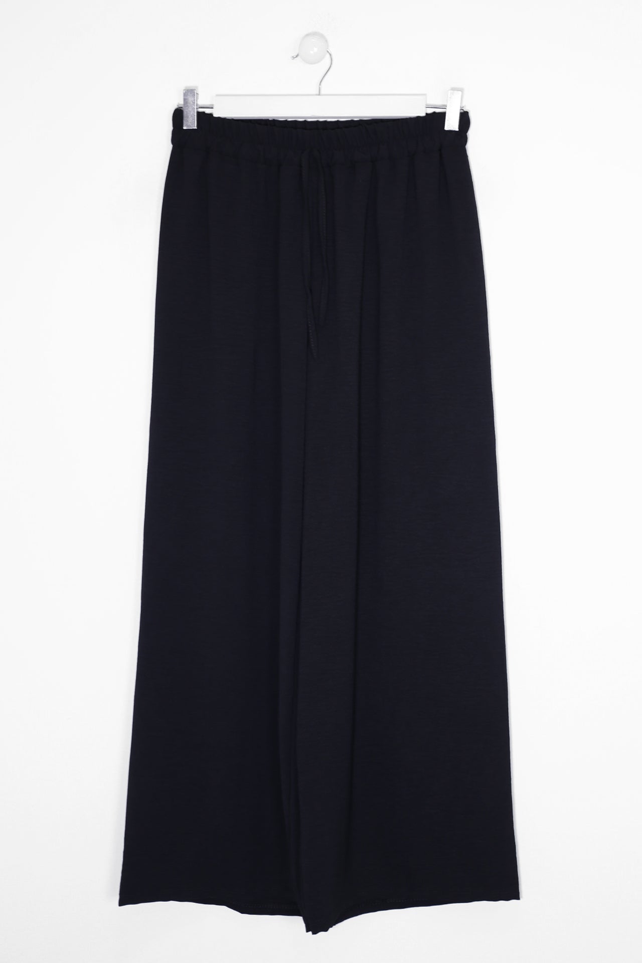 Pantalones fluidos palazzo