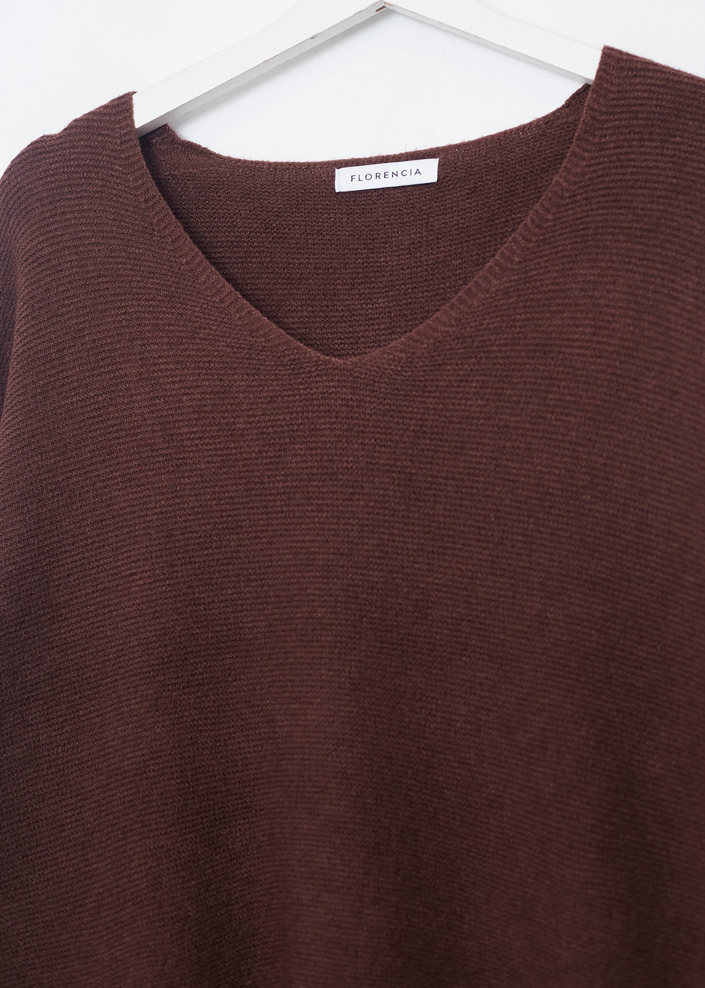 Seamless point-neck sweater