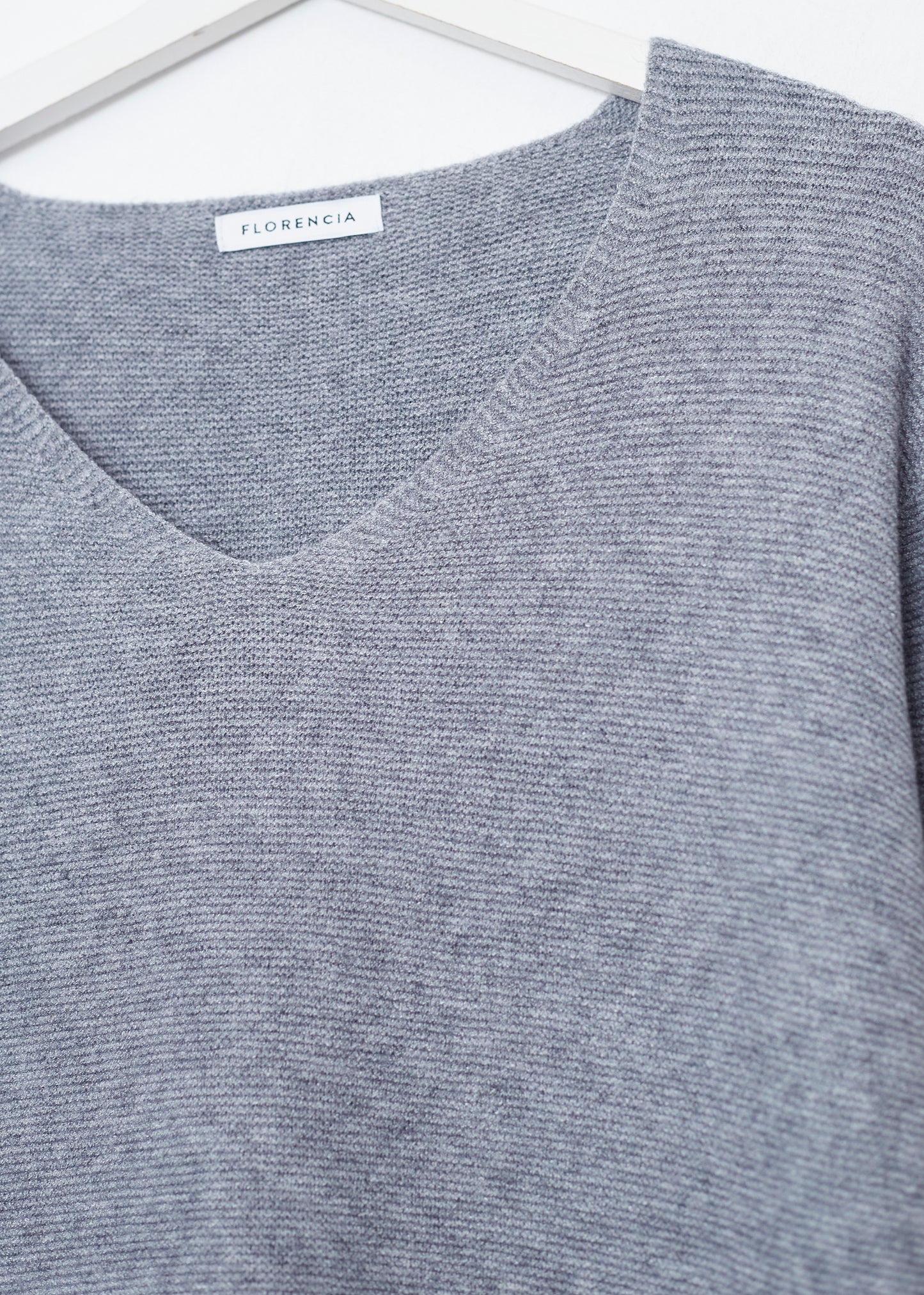Seamless point-neck sweater