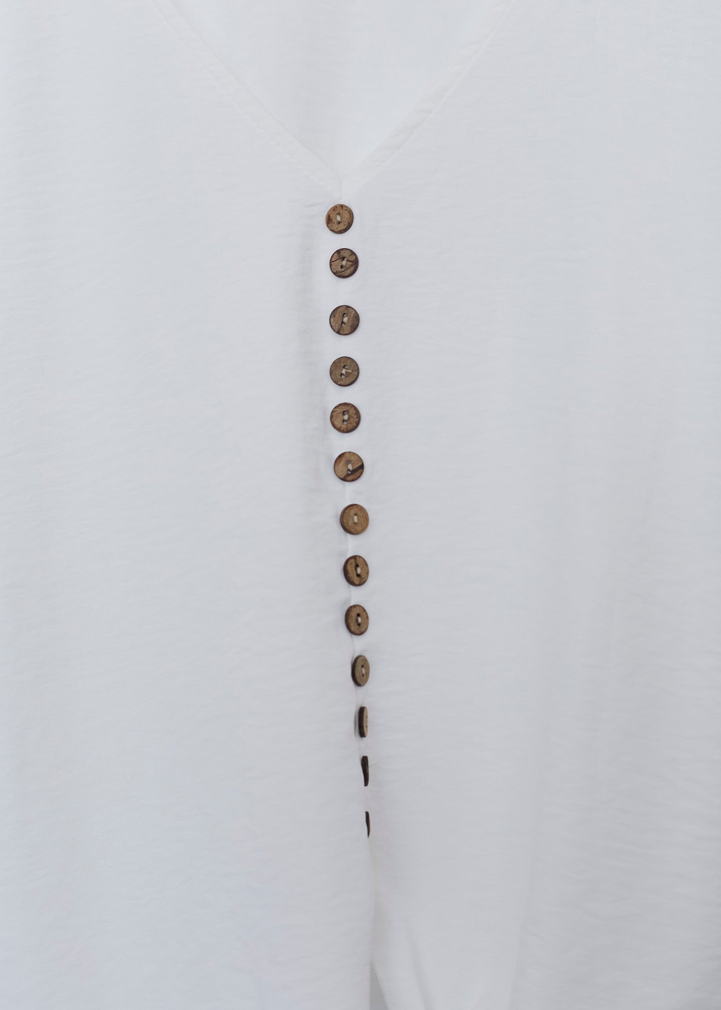 Button knot blouse