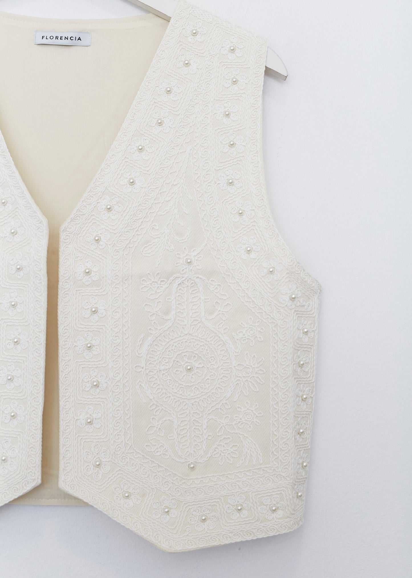 Embroidered and pearl vest