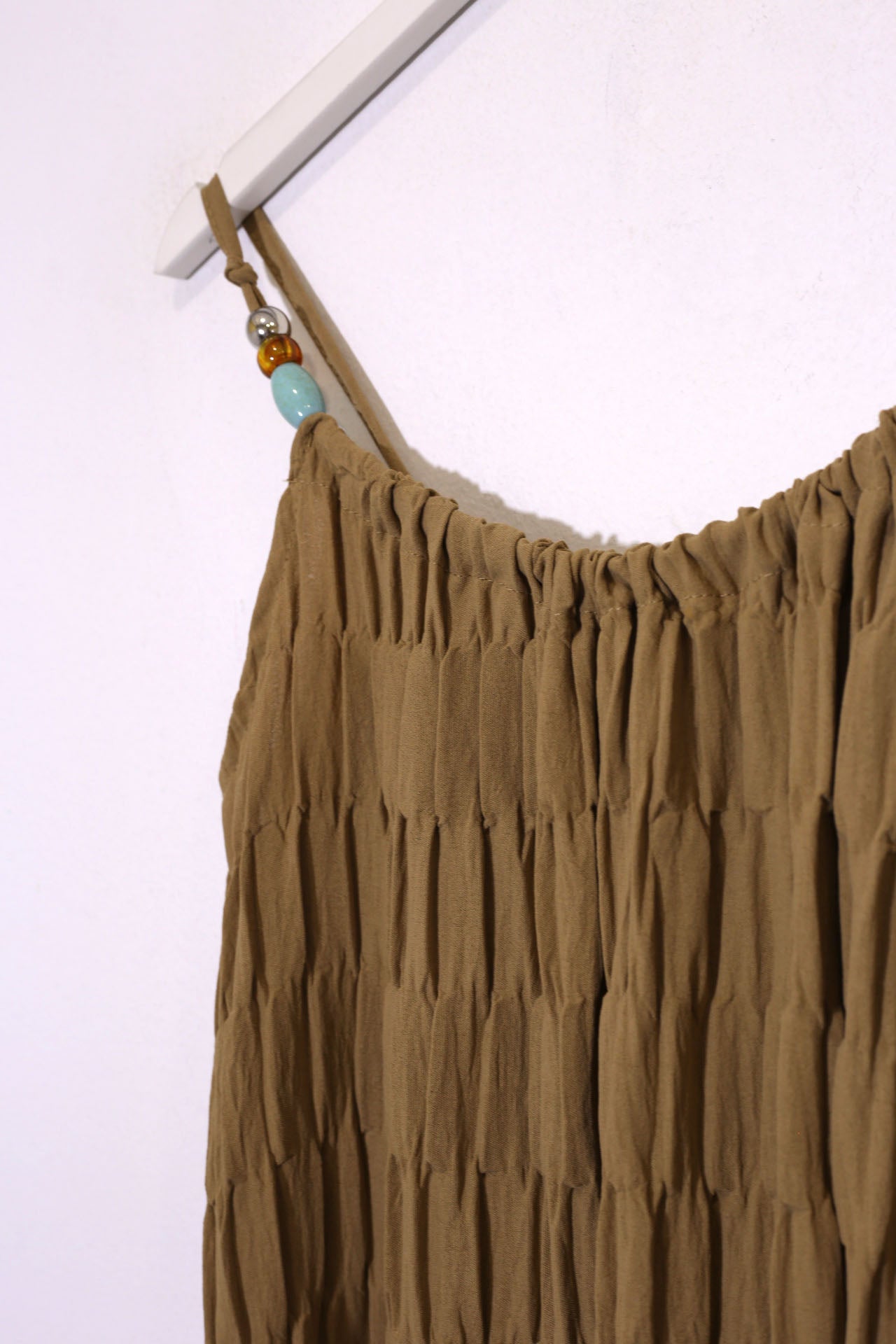 Vestido plisado abalorios