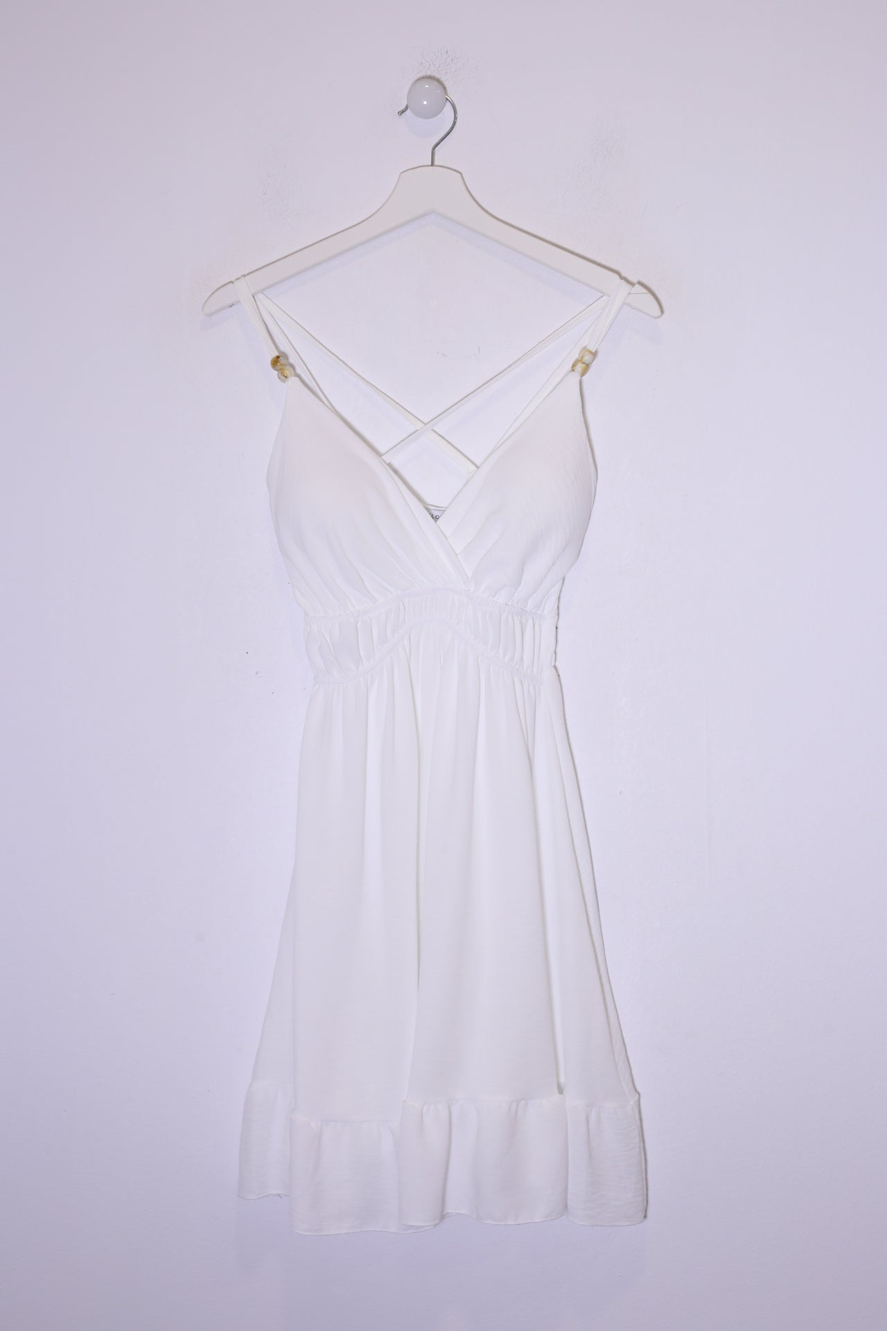 Vestido abalorios fluido corto