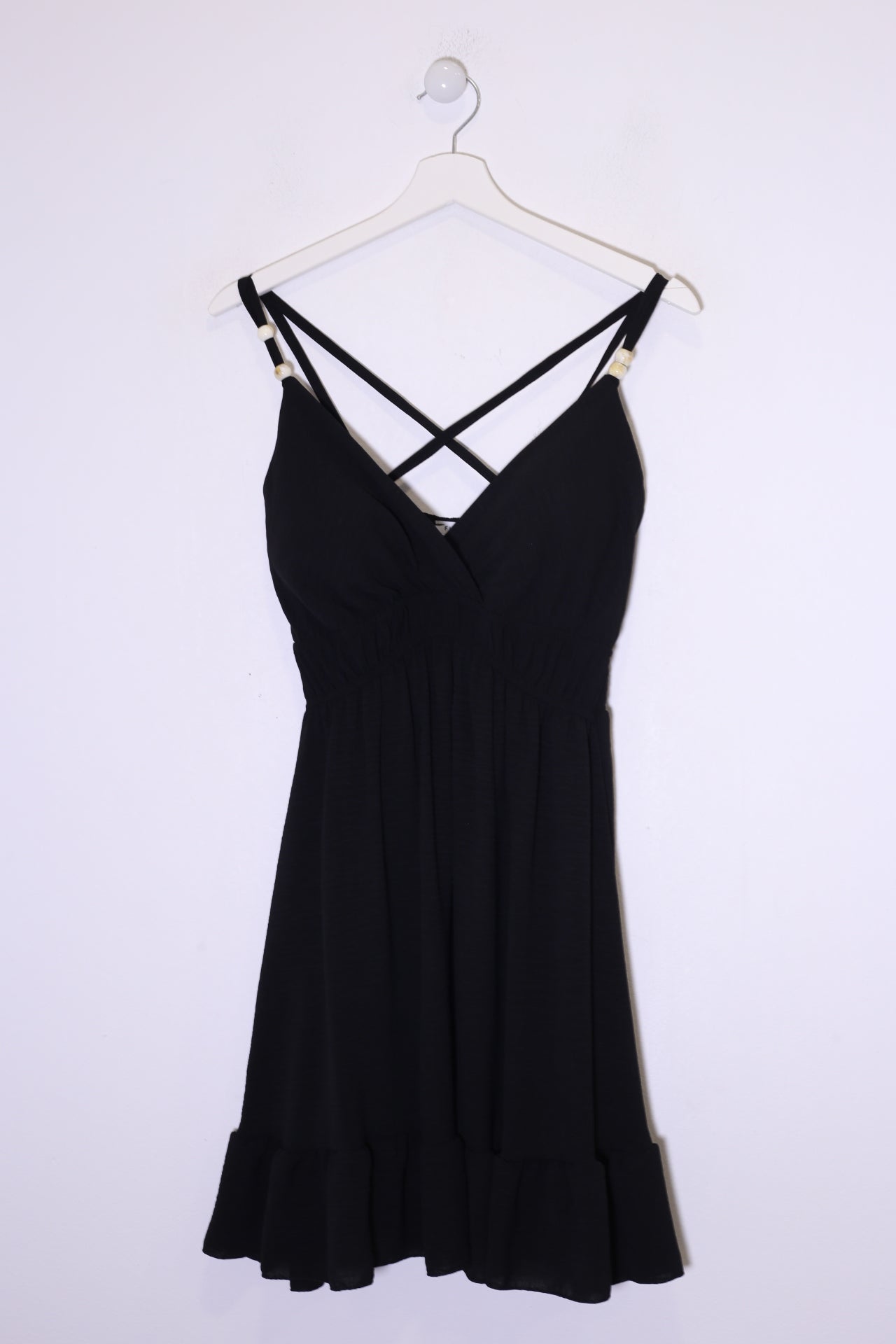 Vestido abalorios fluido corto