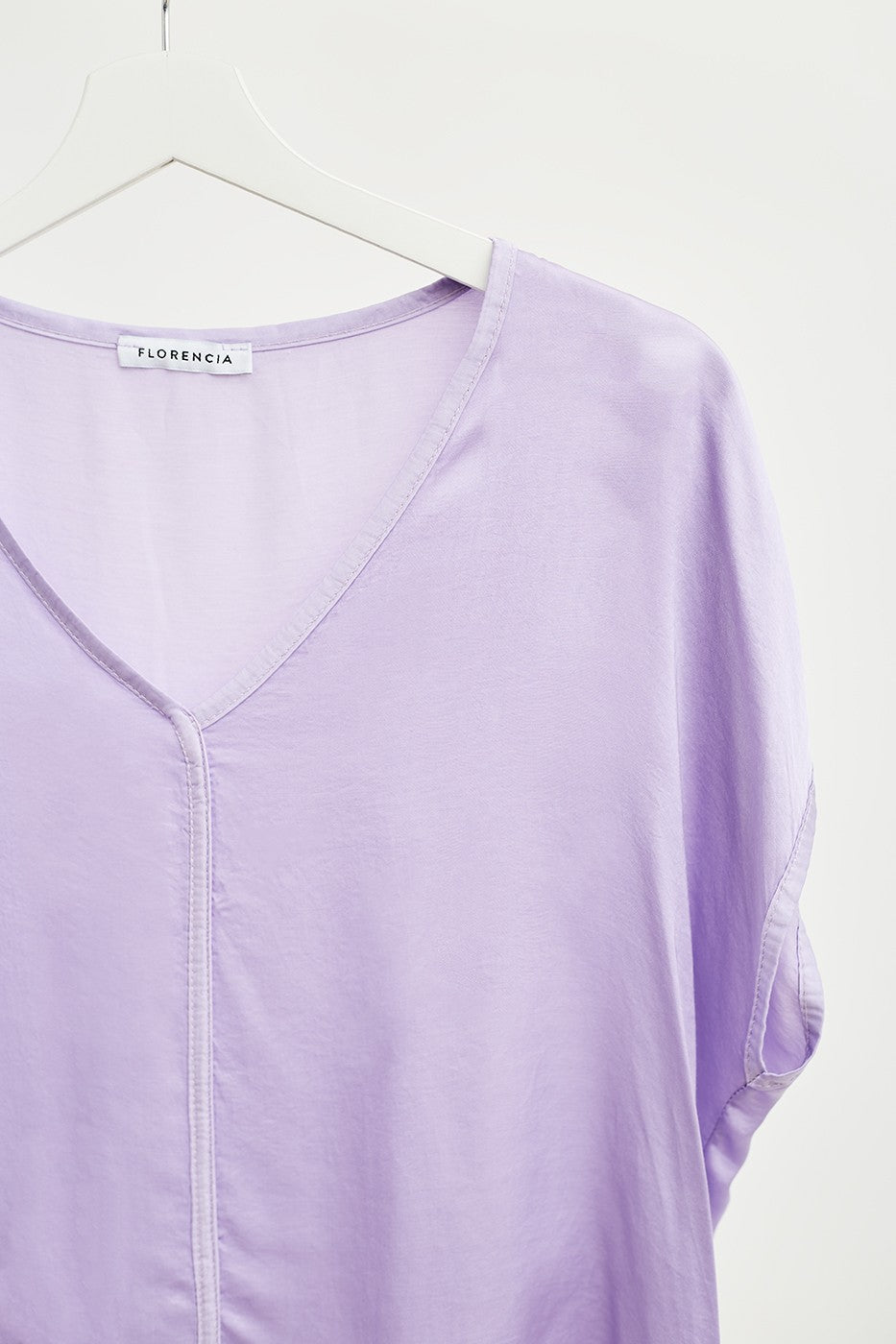 Top satinado detalle costura