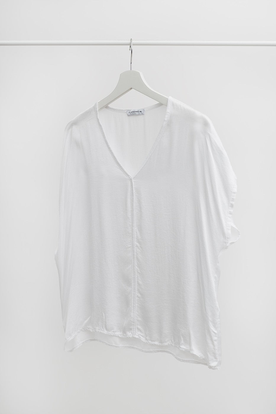 Top satinado detalle costura