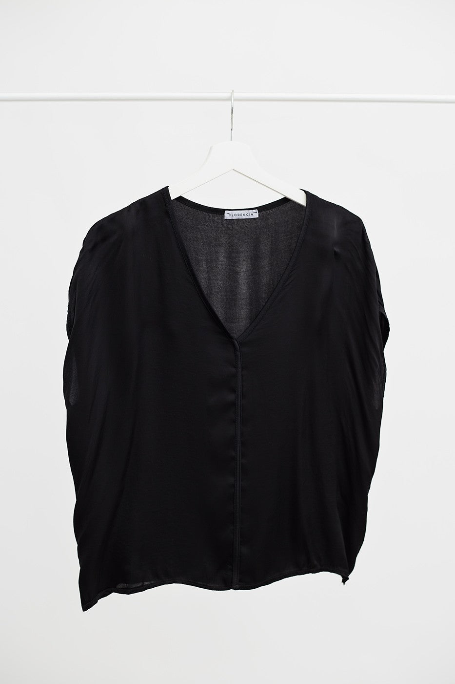 Top satinado detalle costura