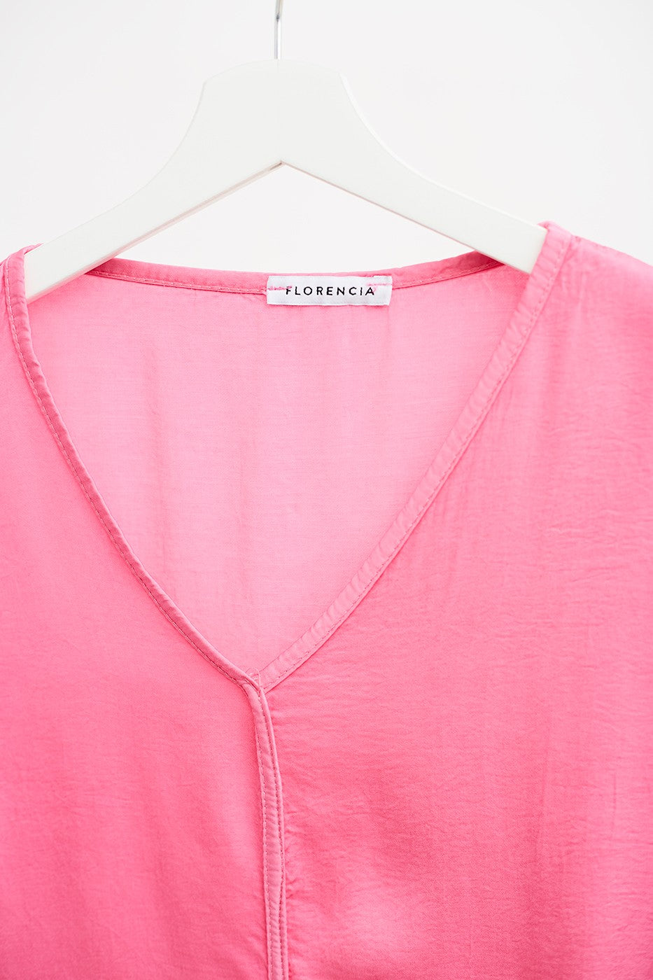 Top satinado detalle costura