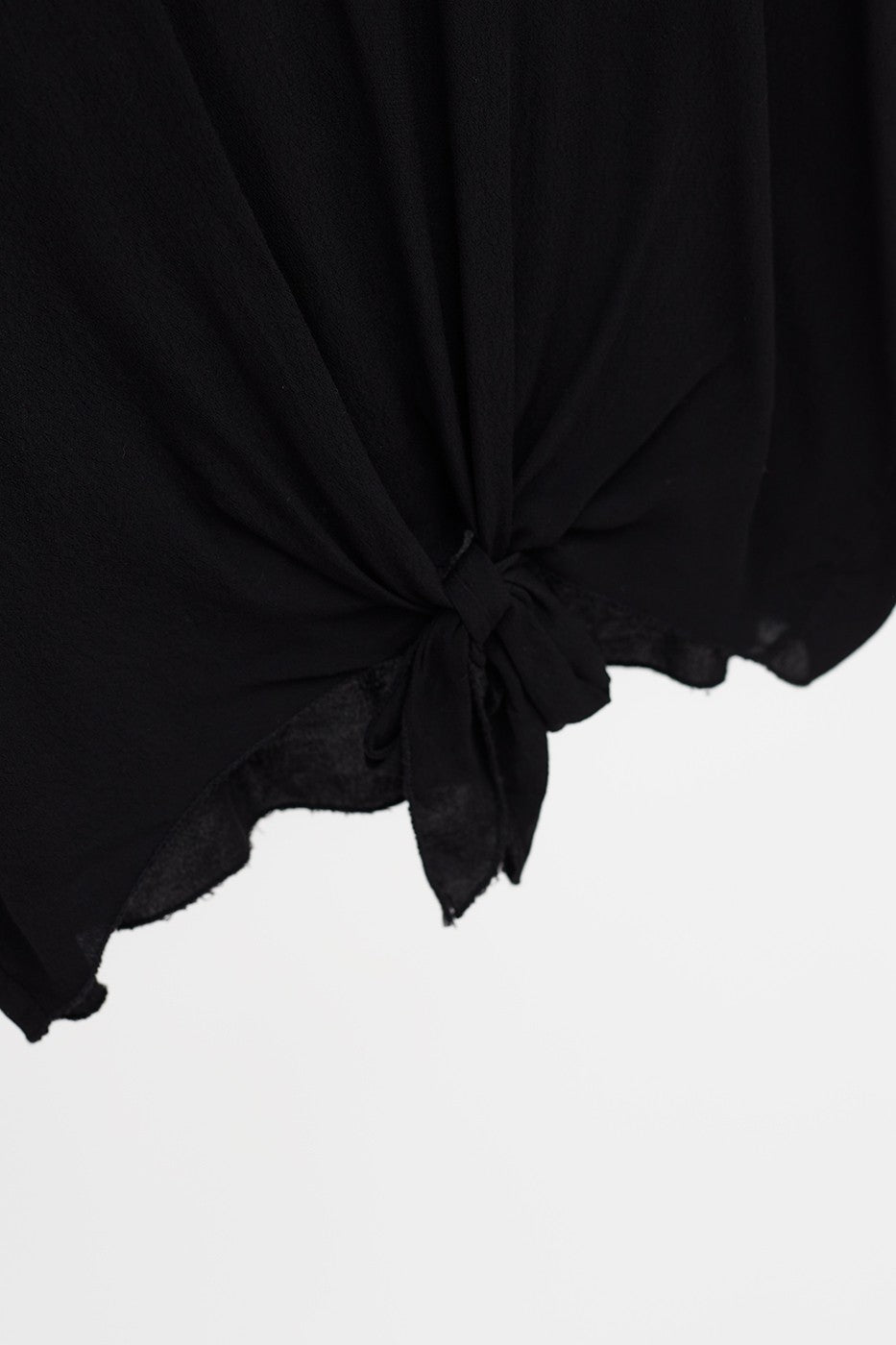 Top detalle satinado y nudo
