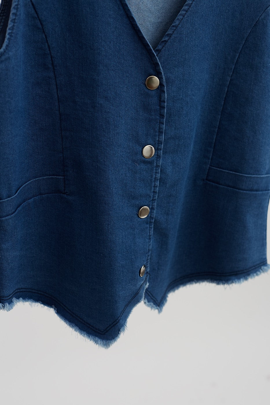 Chaleco denim botones