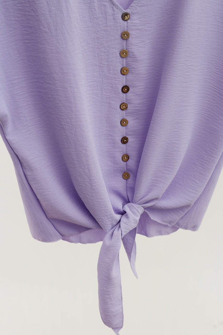 Blusa botones anudada