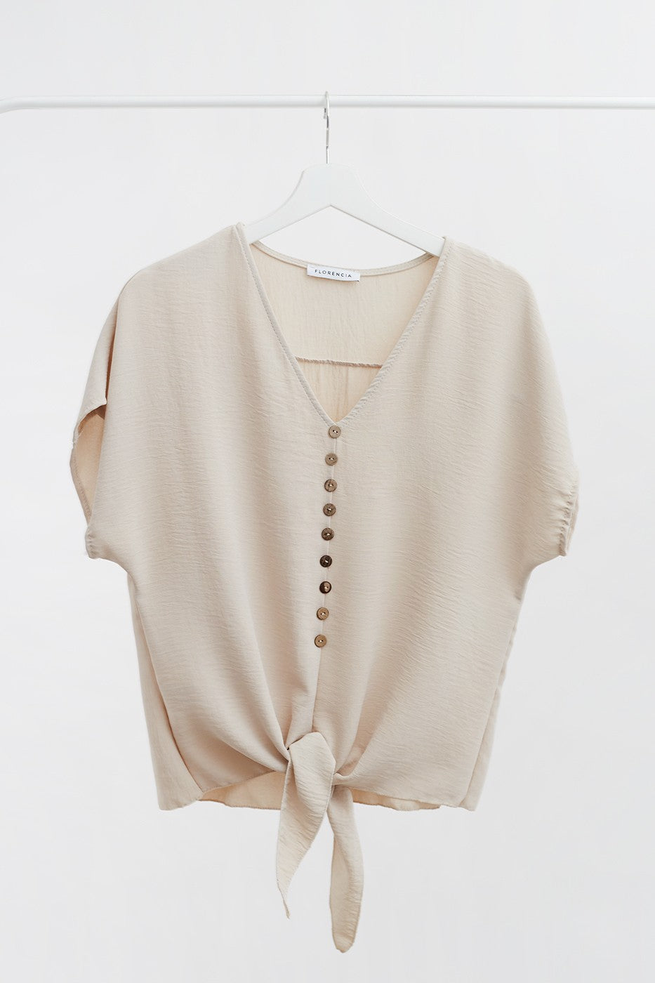 Blusa botones anudada