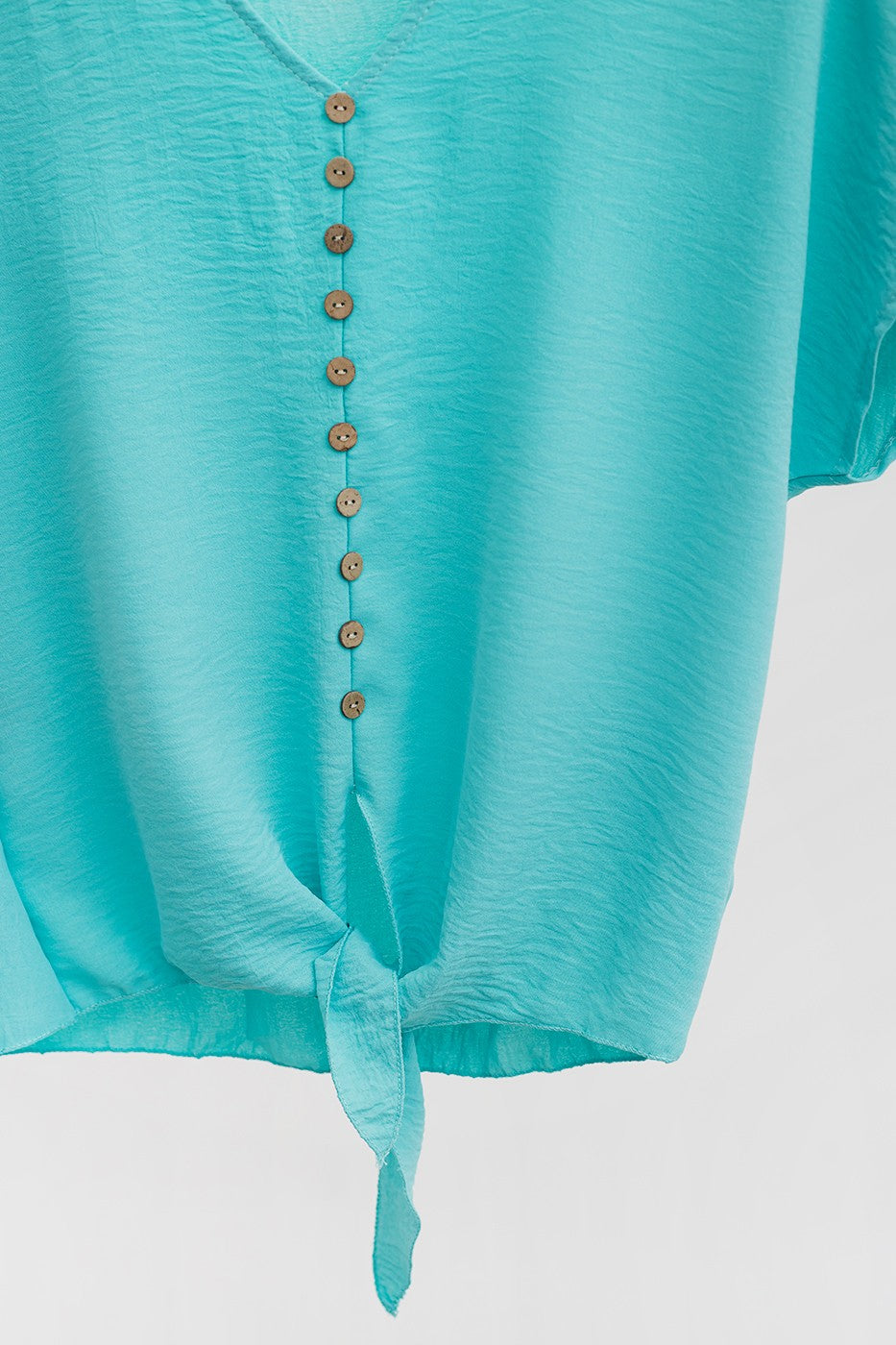 Blusa botones anudada